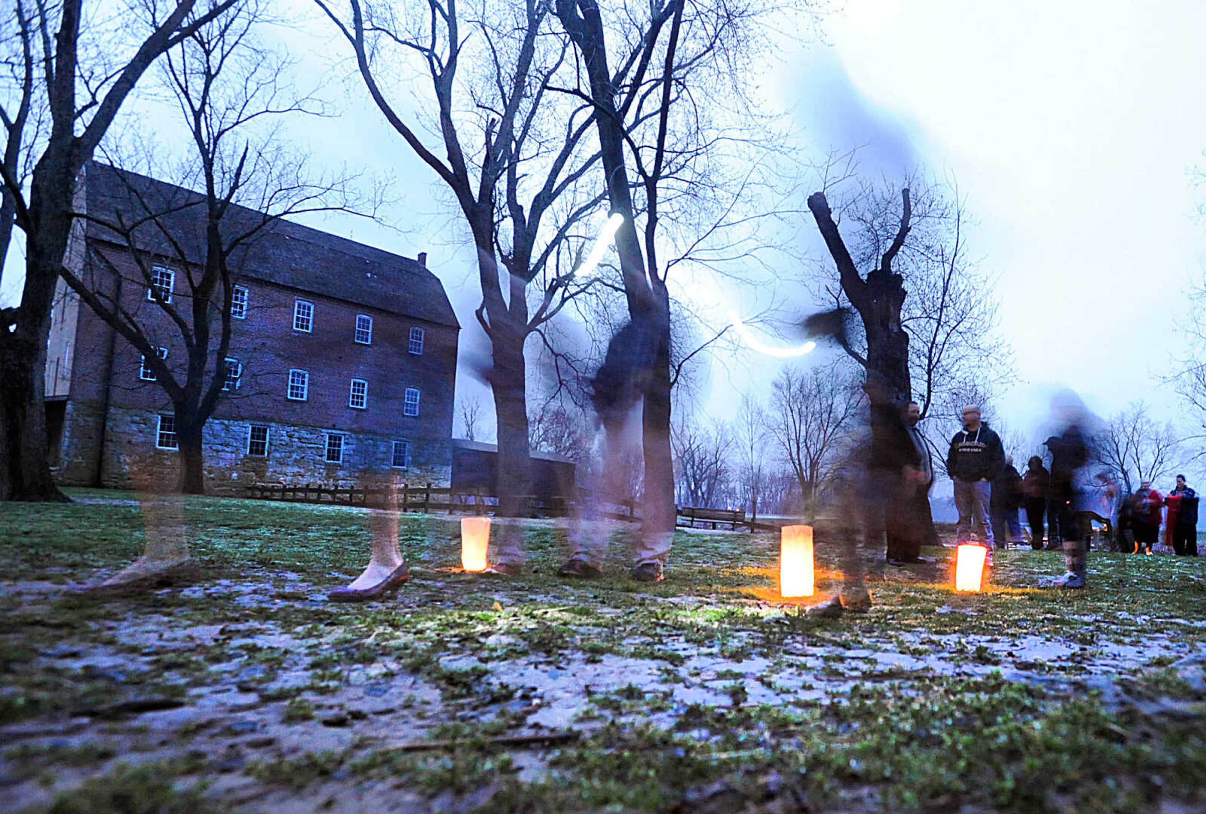 LAURA SIMON ~ lsimon@semissourian.com

Luminaries create a pathway for parishioners leaving after Burfordville Baptist Church's Easter sunrise service along the bank of the Whitewater River Sunday morning, March 31, 2013 at Bollinger Mill State Historic Site.