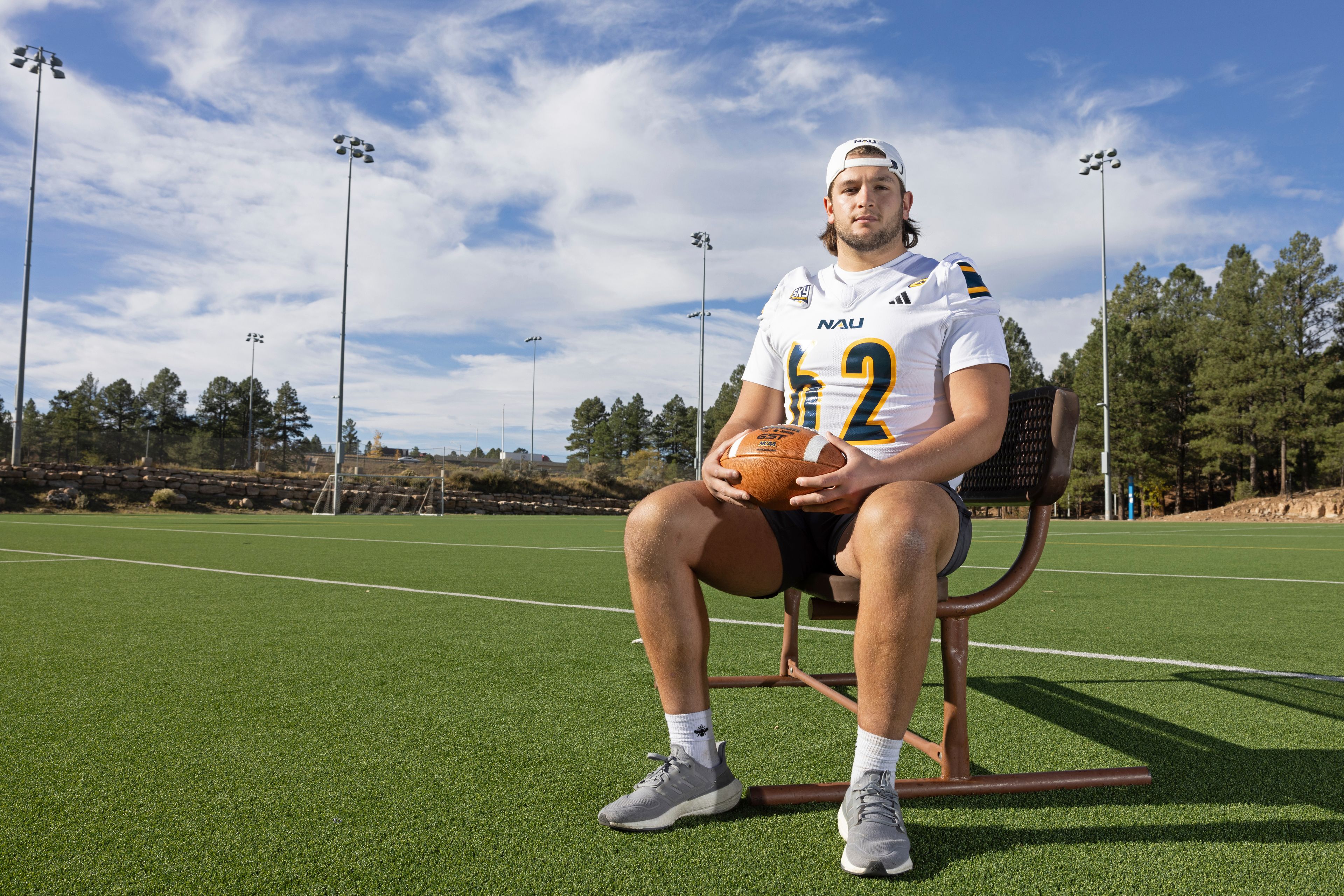 Northern Arizona University's Jonny Bottorff took advantage of new NIL money making opportunities and rebooted his college football career. Bottorff poses for a photo on the campus on NAU on Monday, Oct. 28, 2024, in Flagstaff, Ariz. (AP Photo/Josh Biggs)