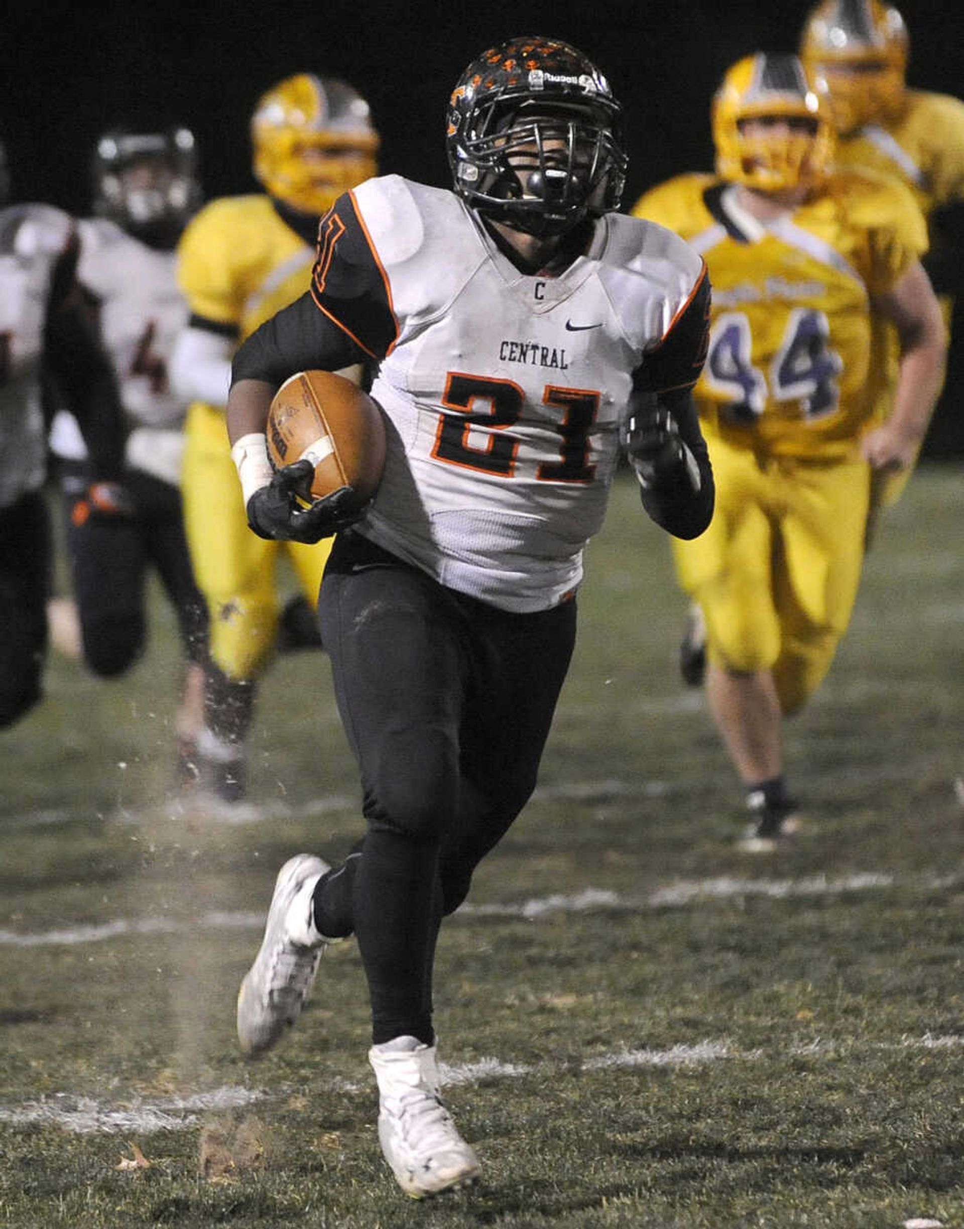 Central running back Braion Owens carries for 51 yards against Affton during the third quarter of the Class 4 state quarterfinal Friday, Nov. 14, 2014 in Affton, Missouri. (Fred Lynch)