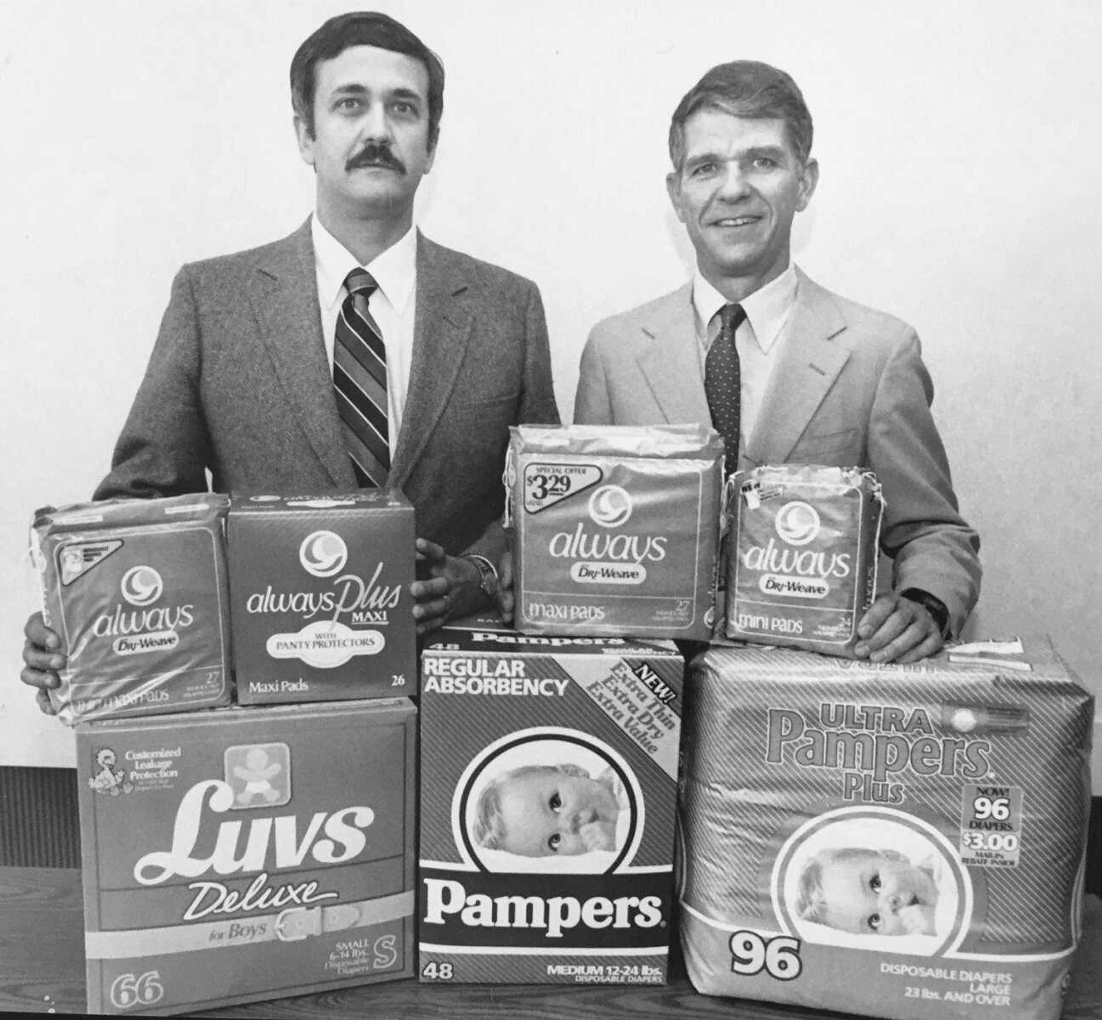 Philip W. Larson, right, Procter & Gamble plant manager, and Larry A. Stahlman, public relations, are shown here with the three products produced at the local P&G plant, in this Southeast Missourian 1989 archive image.