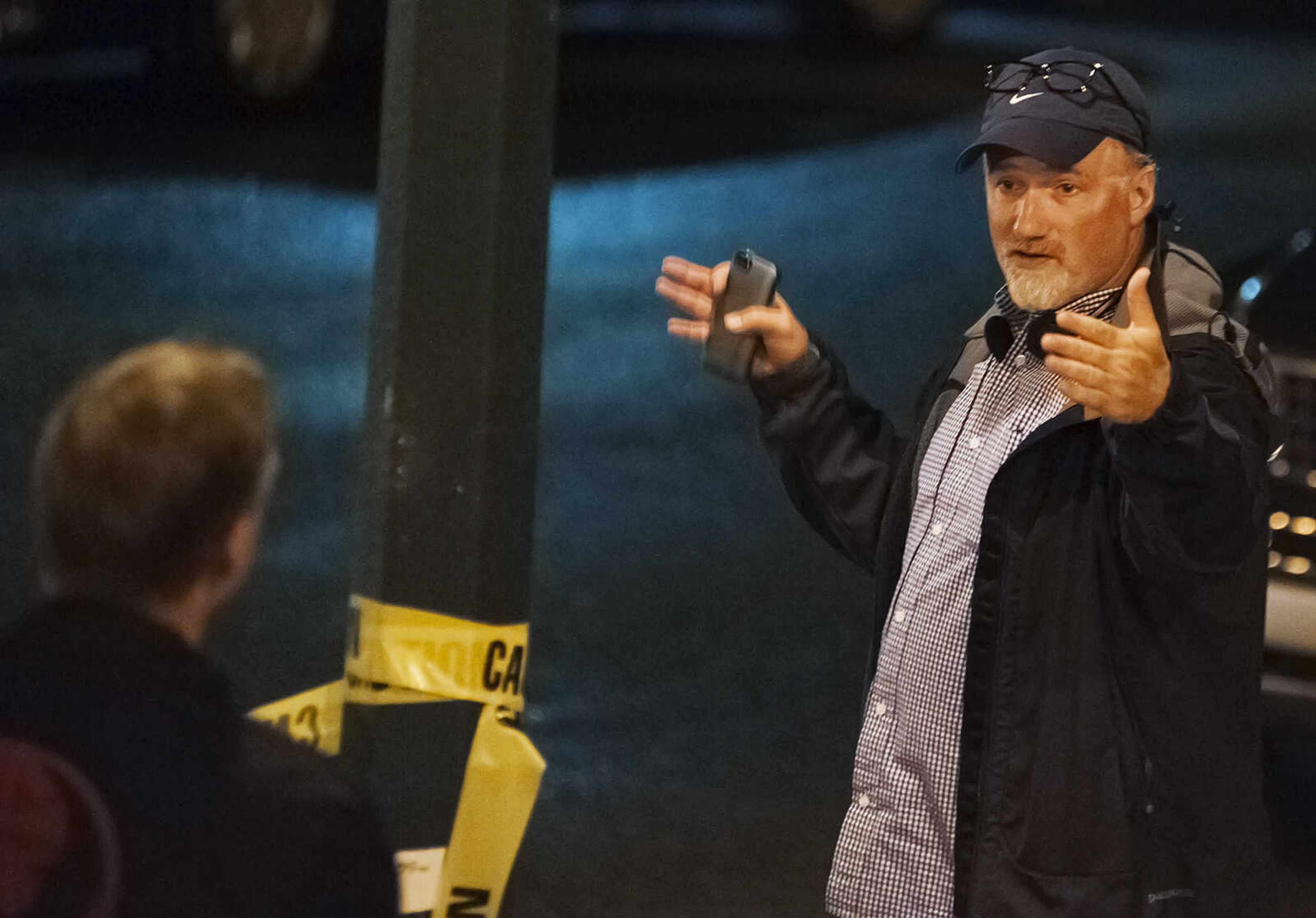 ADAM VOGLER ~ avogler@semissourian.com
Director David Fincher, right, speaks to a crew member while setting up to film a scene for the 20th Century Fox feature film "Gone Girl," Friday, Sept. 27, in downtown Cape Girardeau. Staring Ben Affleck and Rosamund Pike the film is expected to be filming in the Cape Girardeau area for several weeks.