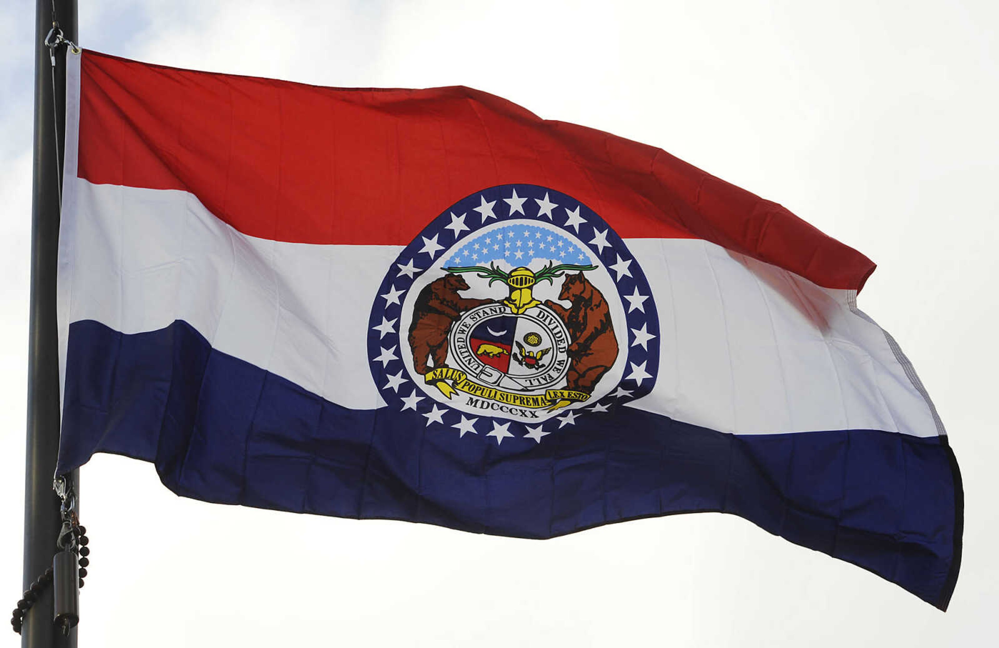 ADAM VOGLER ~ avogler@semissourian.com
The Missouri state flag flies, Tuesday, March 12, outside of the  Oliver-Leming House, 740 North Street, in Cape Girardeau. The flag was designed in the house in 1913 by Marie Watkins Oliver, wife of state Senator R.B. Oliver. The home is now owned by Drs. Bert and Mary Ann Kellerman and will be featured in a three-day Missouri Flag Centennial Celebration scheduled for March 21 - 23.