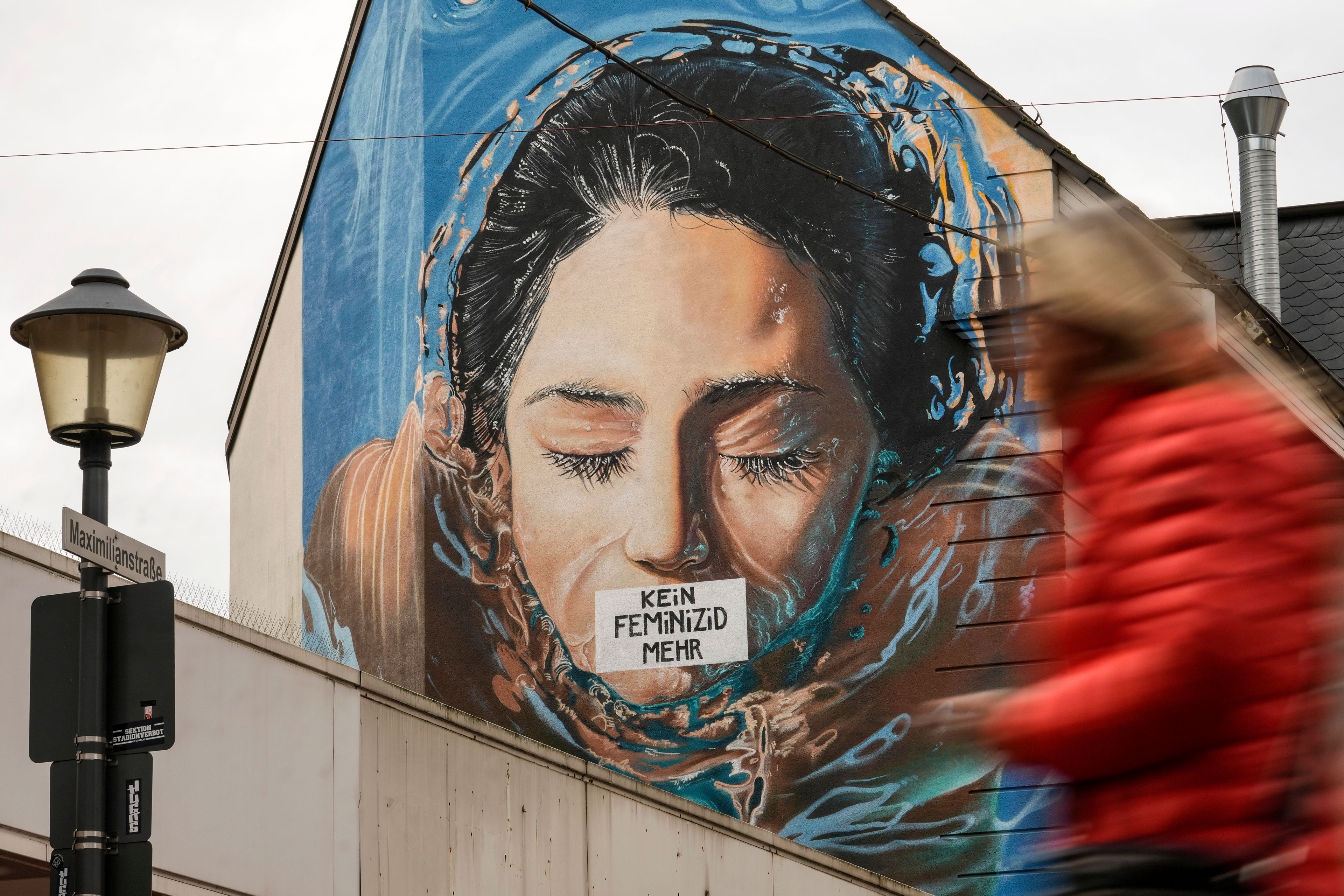 A graffiti, reading "no more feminicide" is sprayed on the wall of a house in Gelsenkirchen, Germany, on the International Day for the Elimination of Violence Against Women, Monday, Nov. 25, 2024. (AP Photo/Martin Meissner)