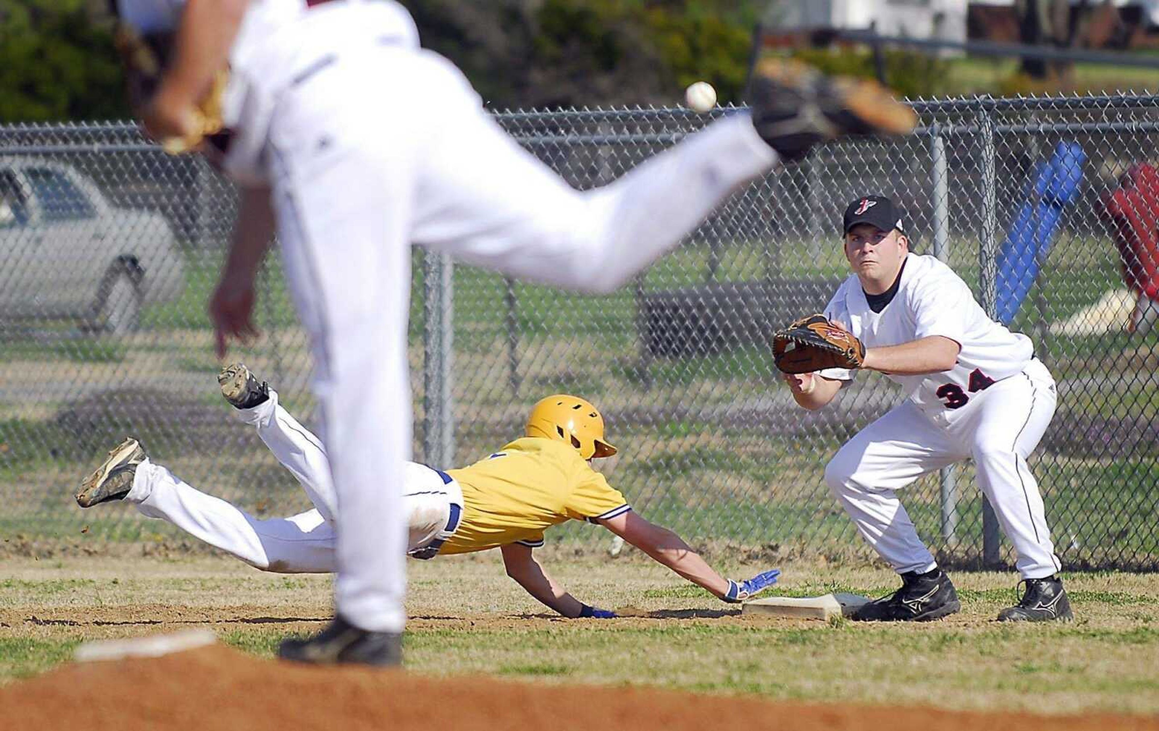 Jackson first baseman Andy Winkleblack awaits a pickoff throw.