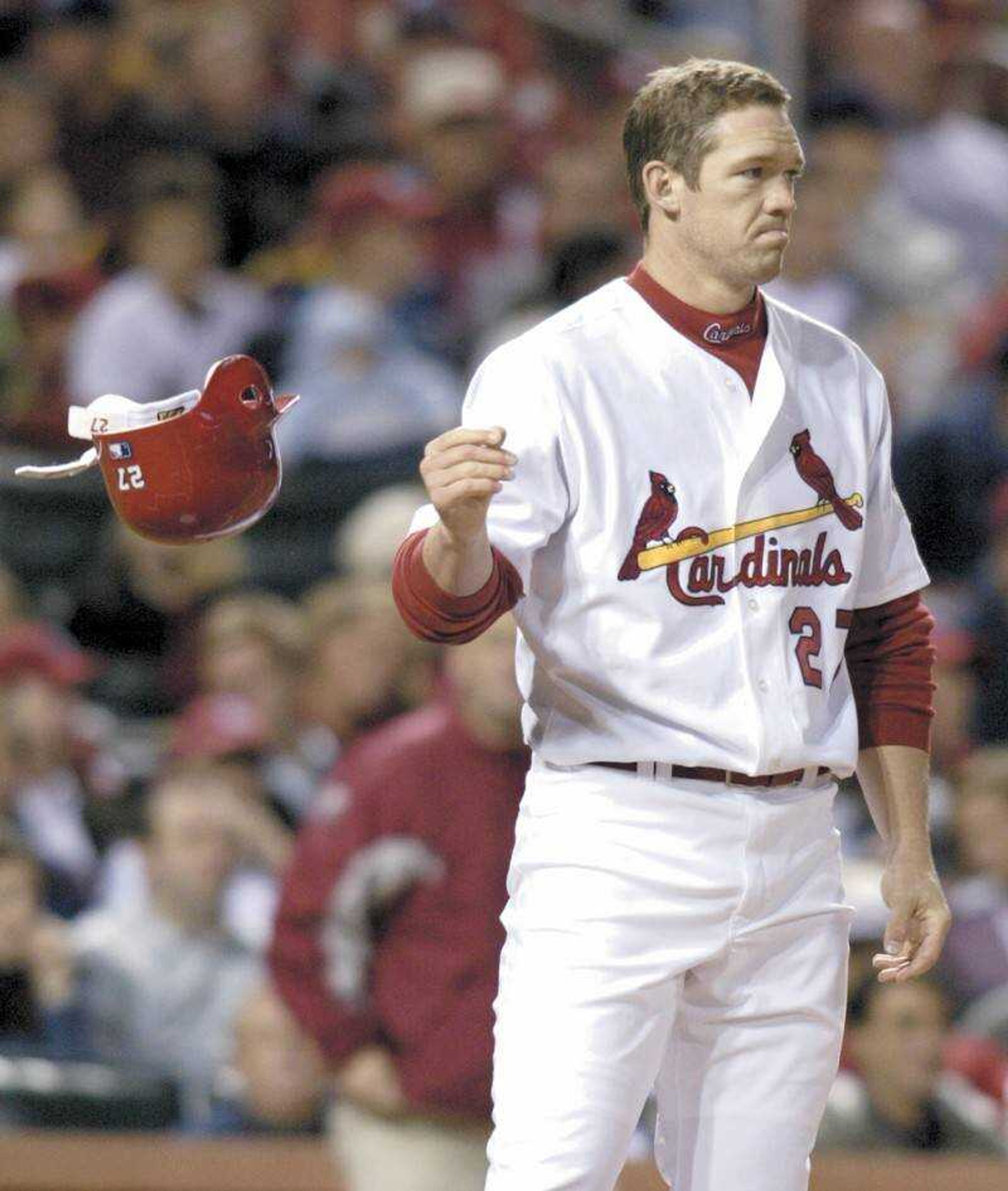 The Cardinals' Scott Rolen tossed his helmet after a called third strike in the first inning against the Milwaukee Brewers on Thursday at Busch Stadium. (AP Photo/Tom Gannam)