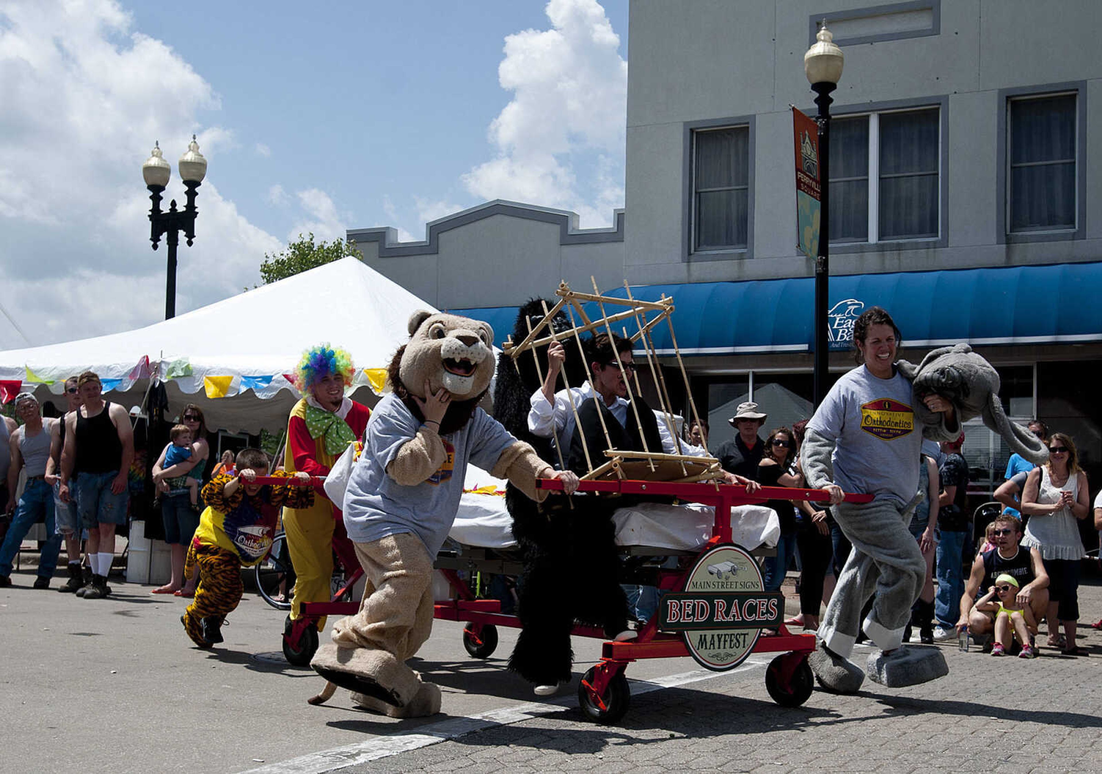 The Innovative Orthodontics team competes in the Perryville Mayfest Bed Races Saturday, May 10, in Perryville, Mo.