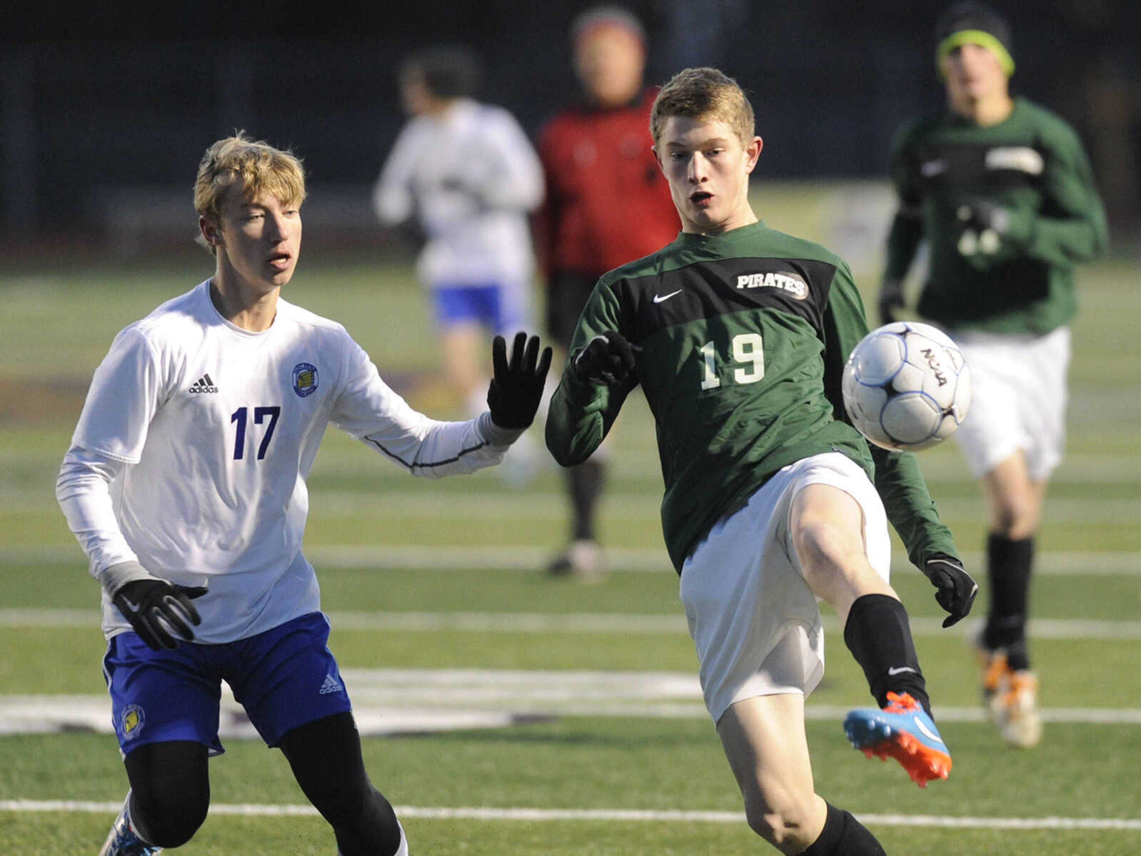 Perryville's Conner Stark settles the ball in the first half of the Class 2 State Semifinal against St. Pius X of Kansas City at Blue Springs High School Friday, Nov. 14, 2014. (Glenn Landberg)