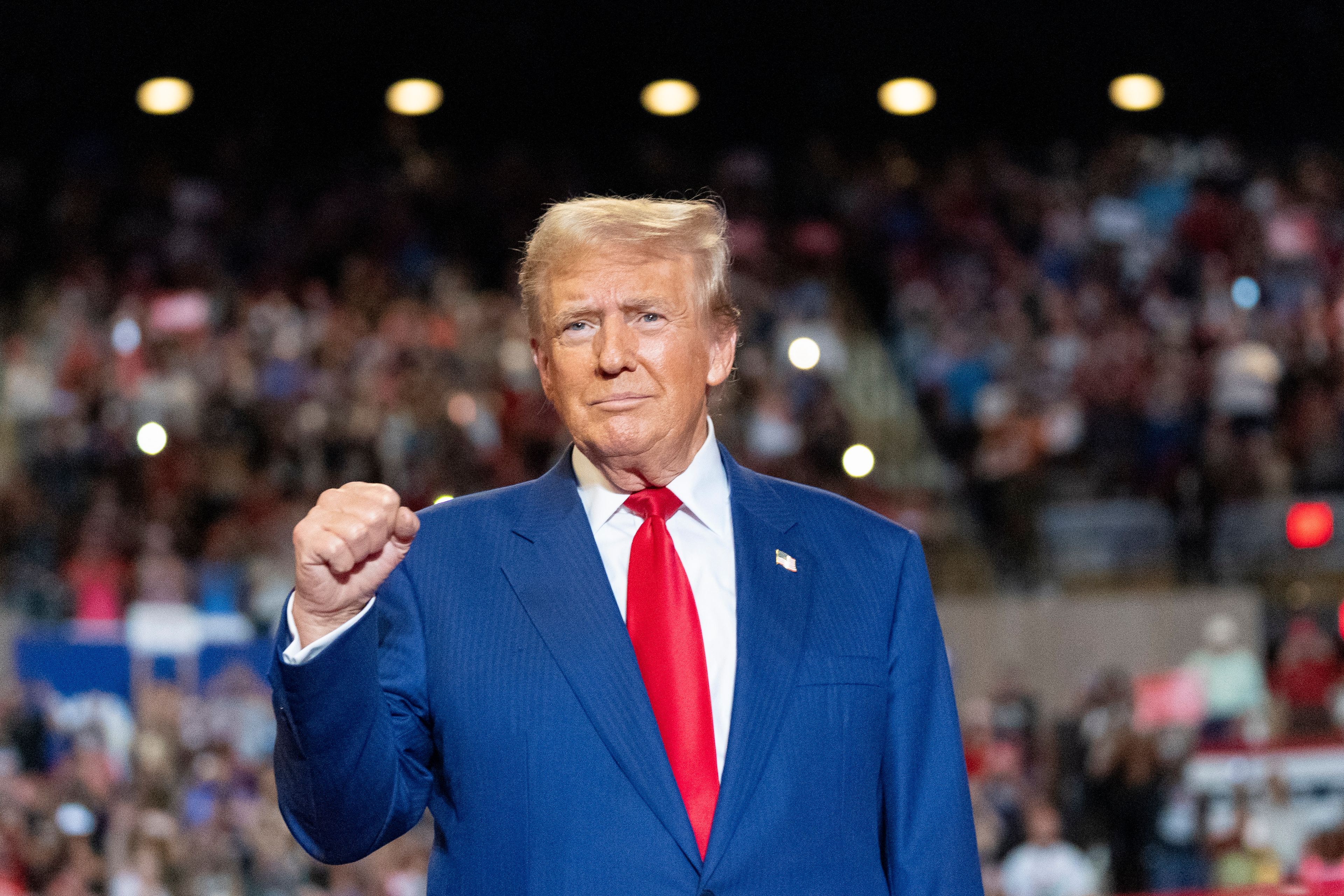 Republican presidential nominee former President Donald Trump pumps his fist as he arrives to speak at a campaign event at Nassau Coliseum, Wednesday, Sept.18, 2024, in Uniondale, N.Y. (AP Photo/Alex Brandon)