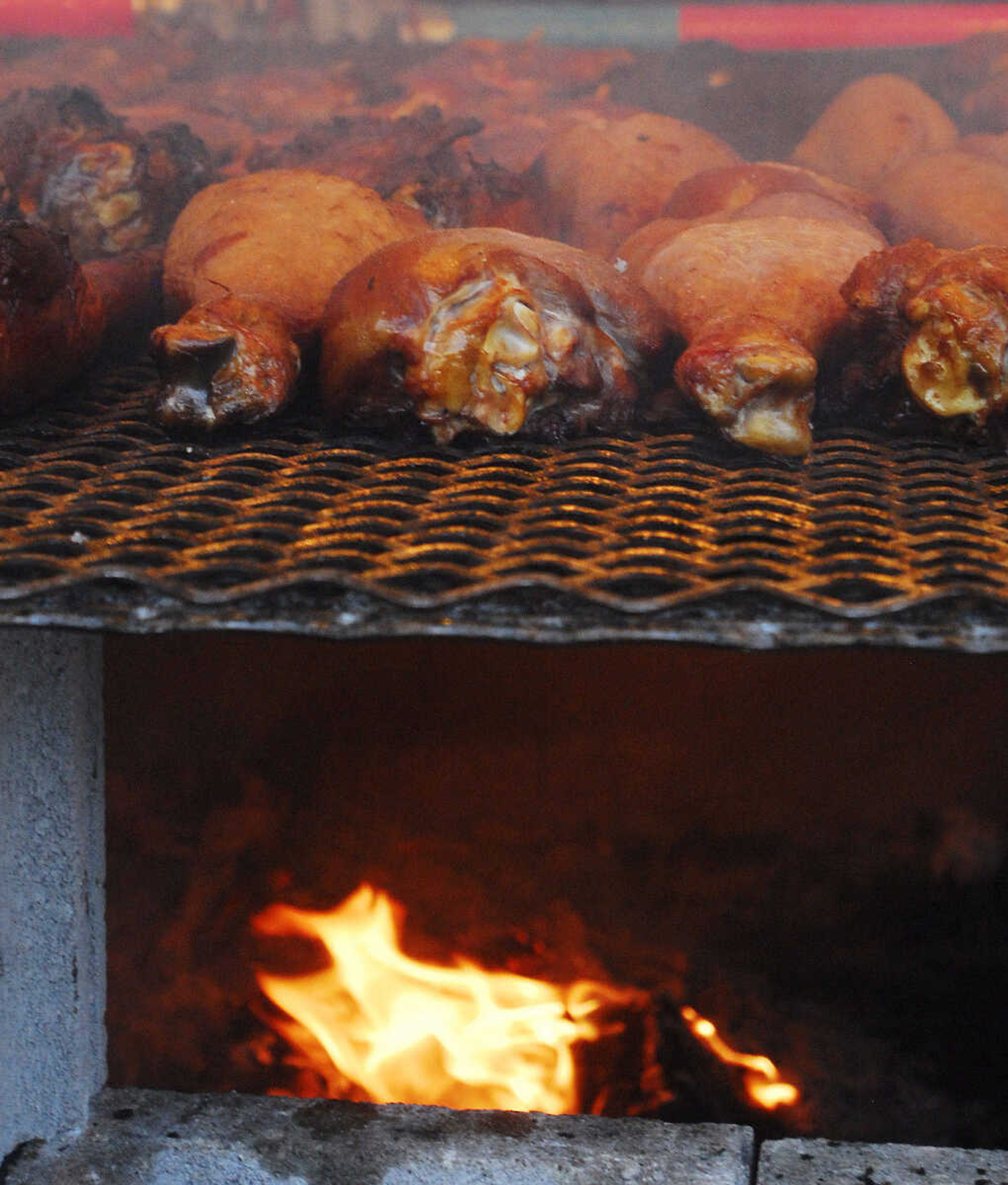 LAURA SIMON~lsimon@semissourian.com
Turkey legs smoke on the wood burning grill Thursday, September 16, 2010 during the 155th Annual SEMO District Fair.