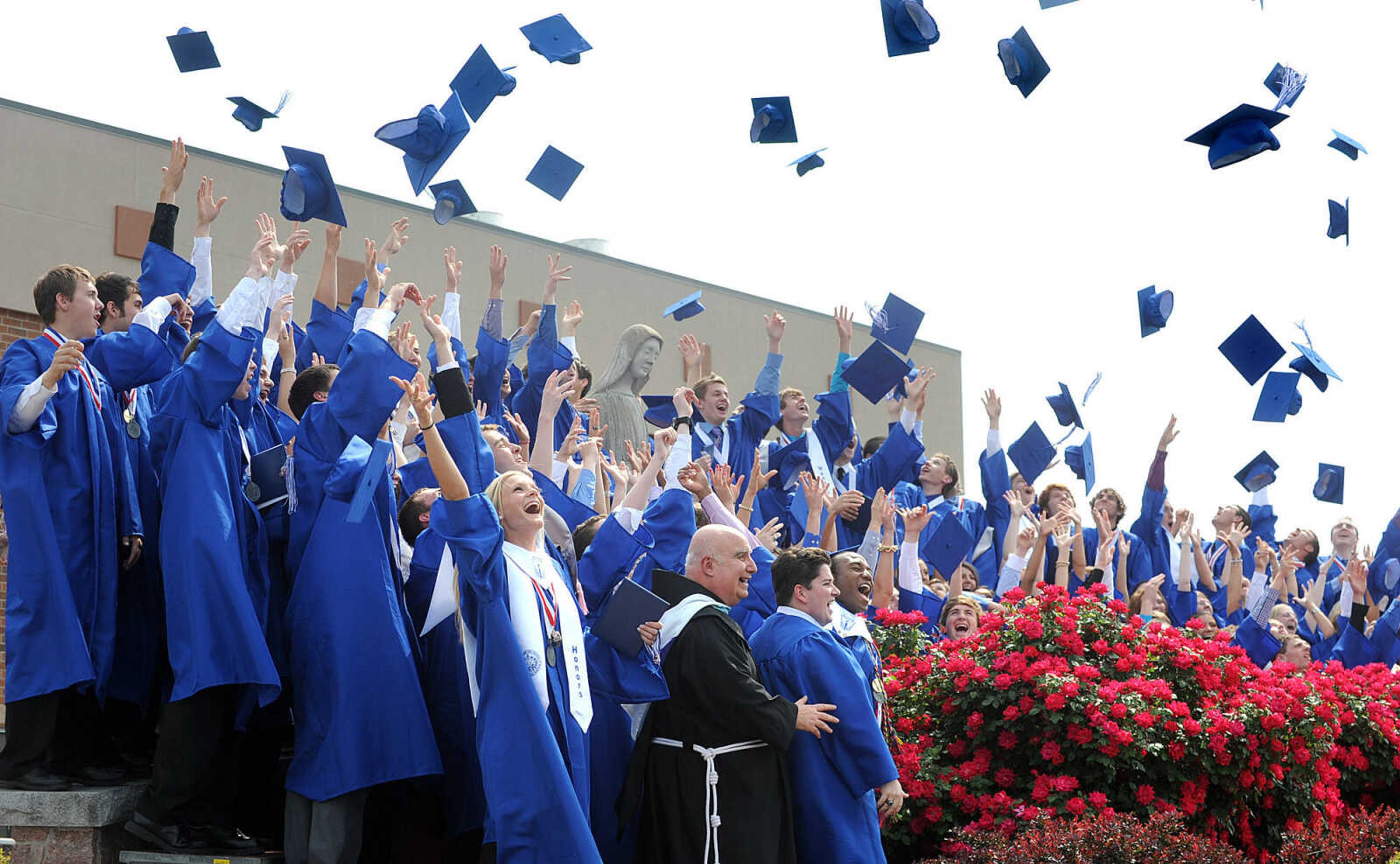 LAURA SIMON ~ lsimon@semissourian.com

The eighty-fifth graduating class of Notre Dame Regional High School throw their hats in the air, Sunday, May 19, 2013, in celebration of their commencement.