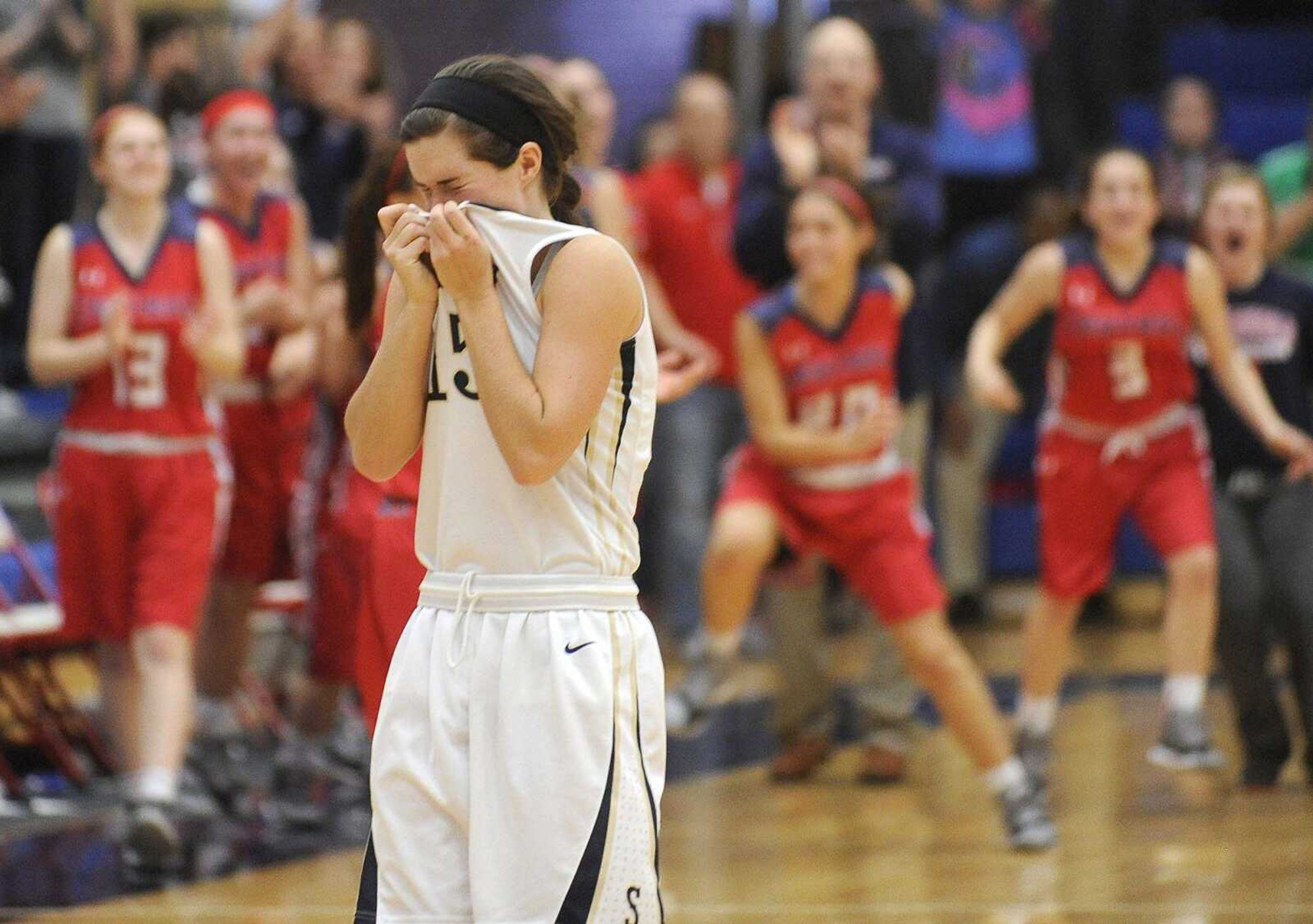 Saxony Lutheran's Briana Mueller leaves the court after her team's loss to Park Hills Central in the Class 3 state quarterfinal Saturday, March 7, 2015 in Hillsboro, Missouri. (Fred Lynch)