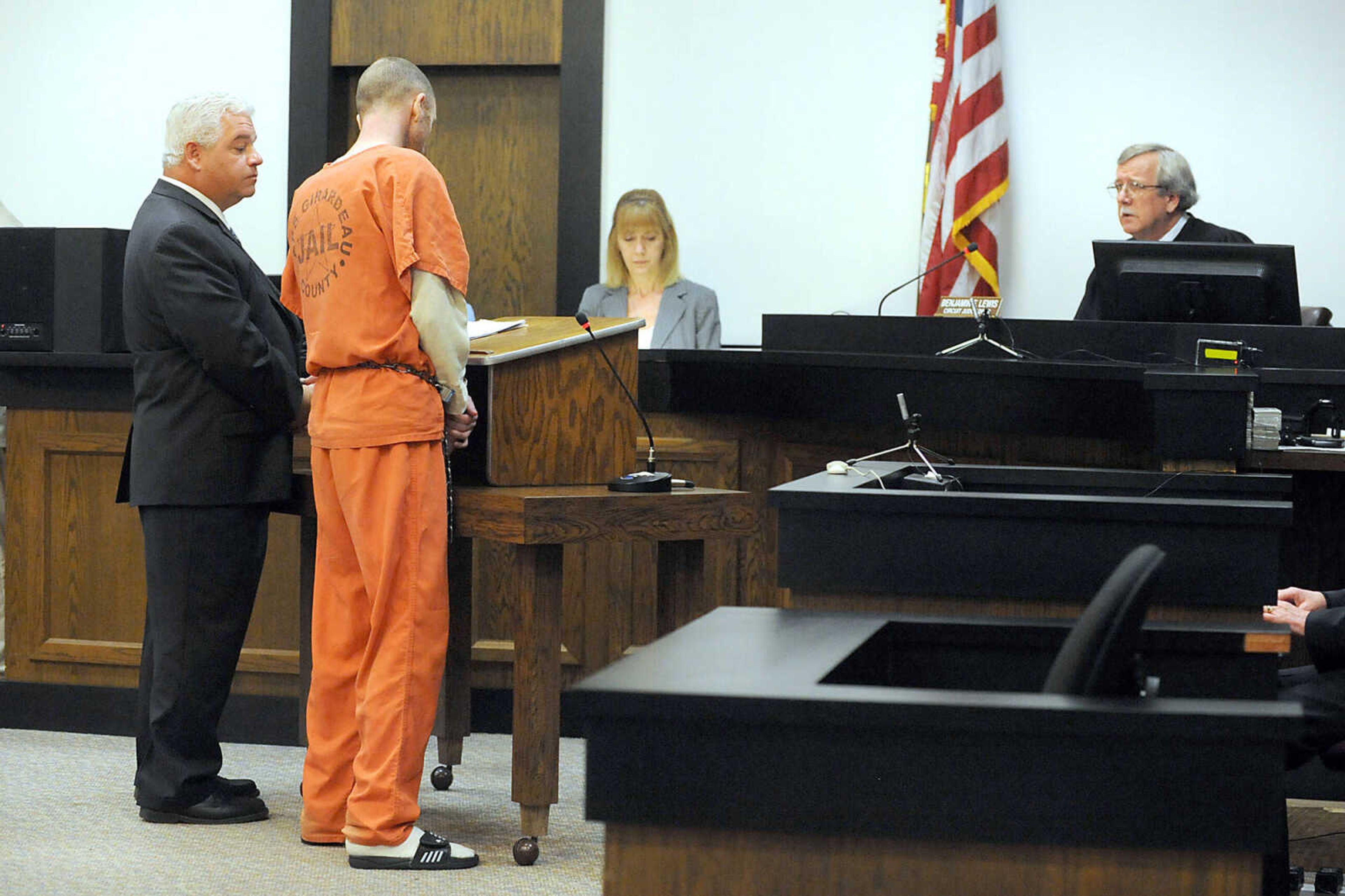 LAURA SIMON ~ lsimon@semissourian.com 
Clay Waller and his public defender Chris Davis address Cape Girardeau County Circuit Judge Ben Lewis, Thursday, June 6, 2013, at the Cape Girardeau County Courthouse. Waller pleaded guilty to second-degree murder for the death of his wife, Jacque Waller. Jacque Waller went missing June 1, 2011. Her body was found last Wednesday in Southern Illinois.