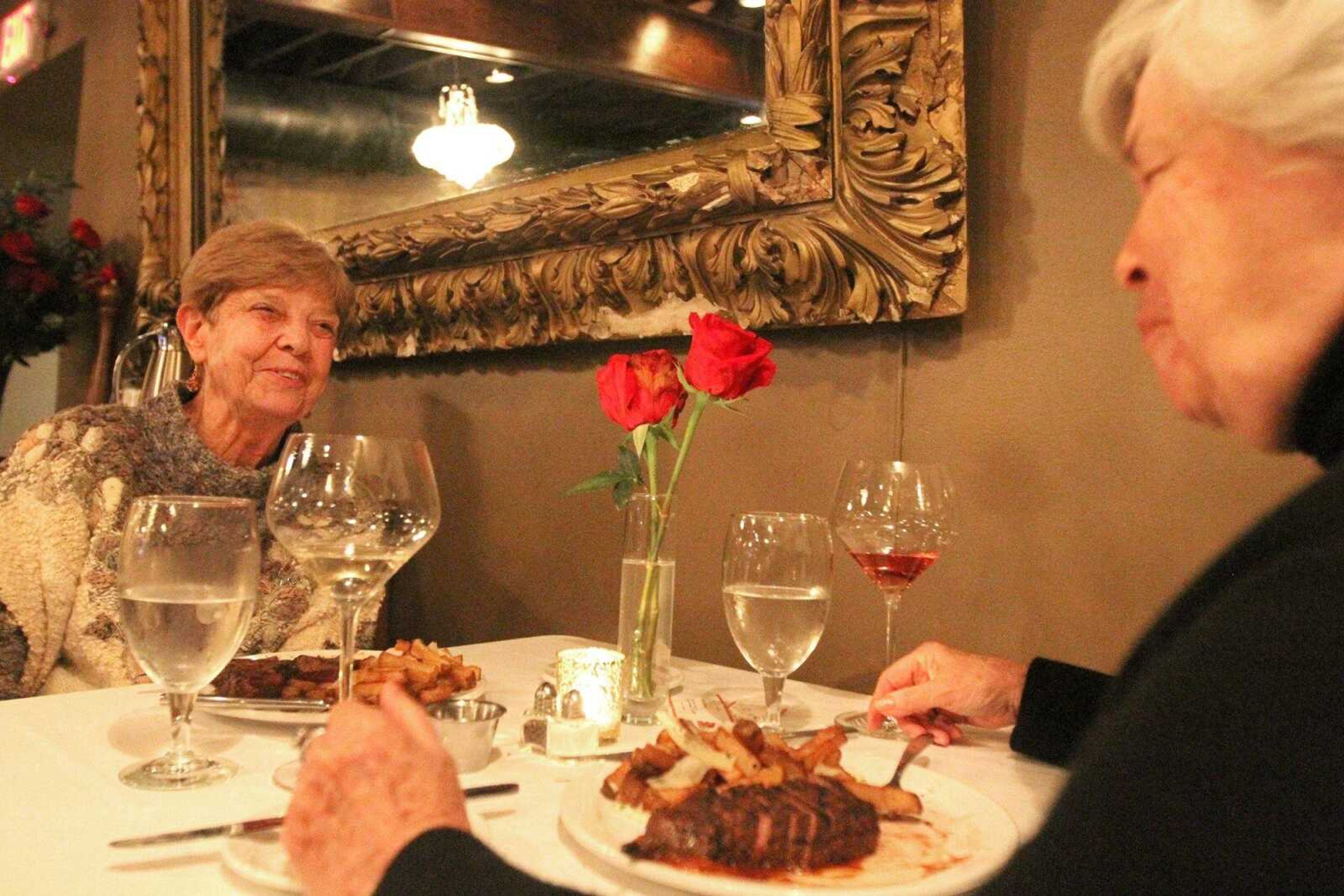 Mary McClary, left, and Betty Henson enjoy a stake and frites meal at 36 Restaurant and Bar Tuesday in downtown Cape Girardeau. (Glenn Landberg)