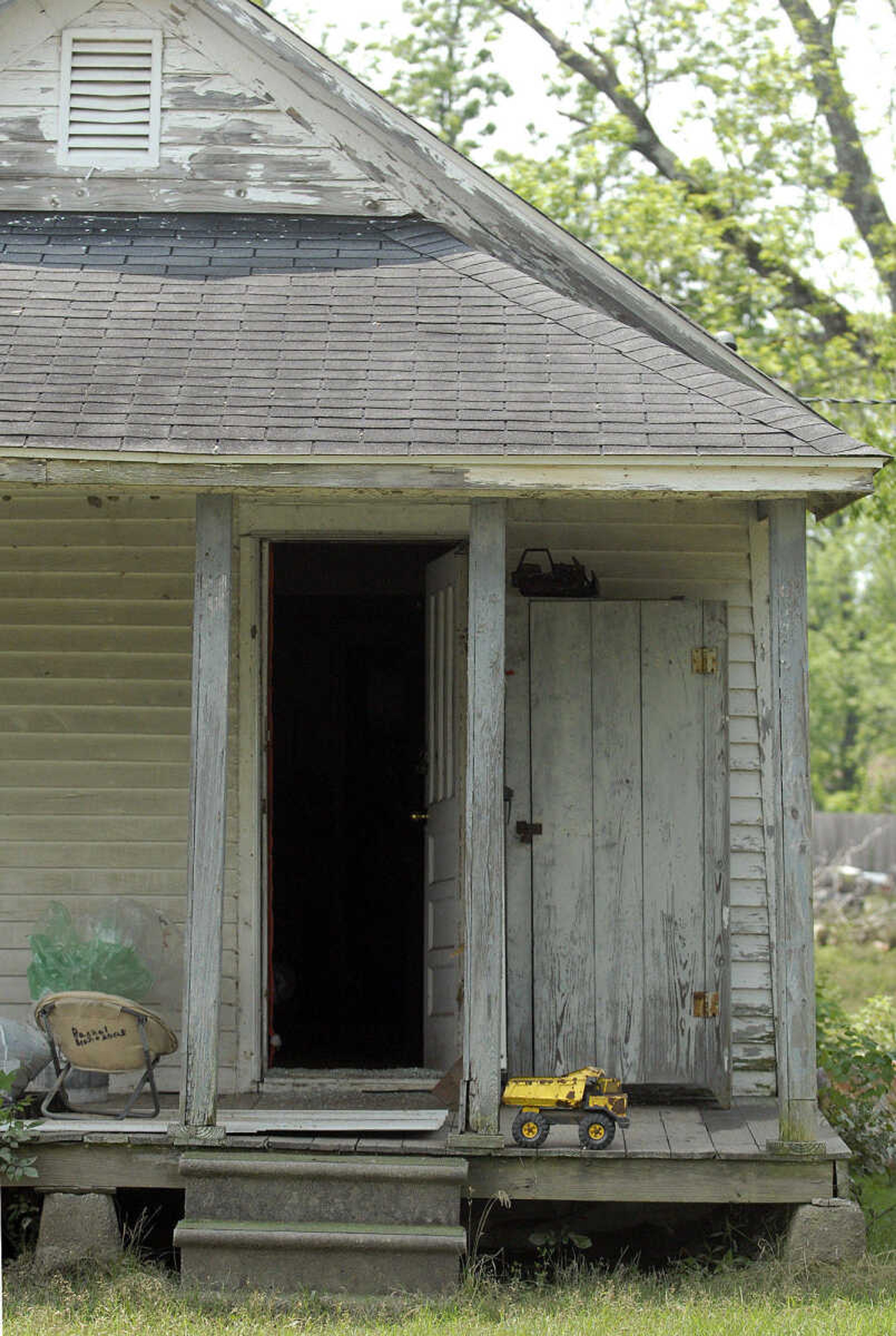 LAURA SIMON~lsimon@semissourian.com
A child's dump truck sets on the porch of this empty Morehouse, Mo. home Wednesday, May 11, 2011.