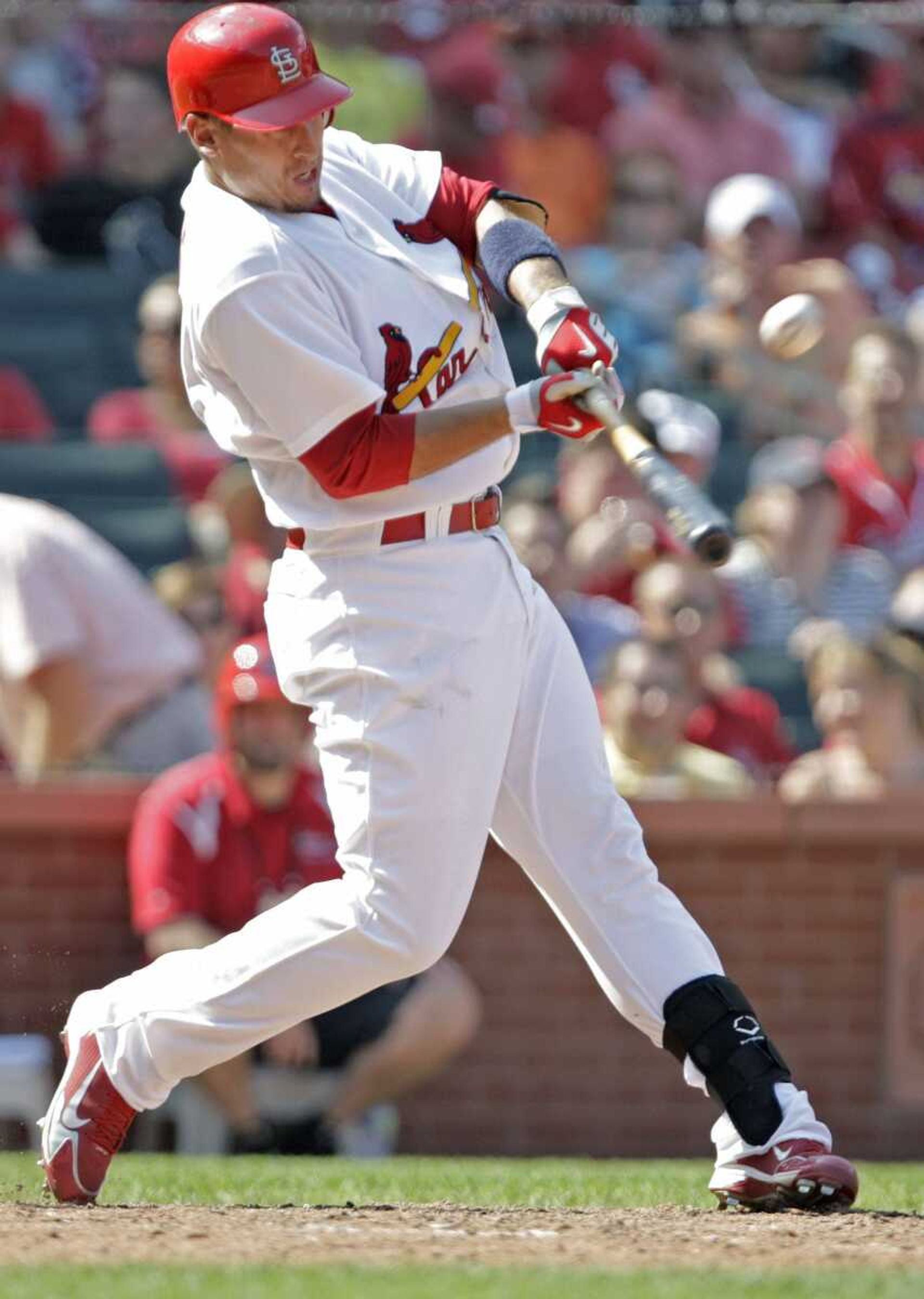 St. Louis Cardinals' Allen Craig (8) connects for a RBI single in the eighth inning of a baseball game against the San Francisco Giants, Sunday, Aug. 22, 2010 in St. Louis. Craig had two hits, including a two-run home run, and three rbi's as the Cardinals beat the Giants 9-0.(AP Photo/Tom Gannam)