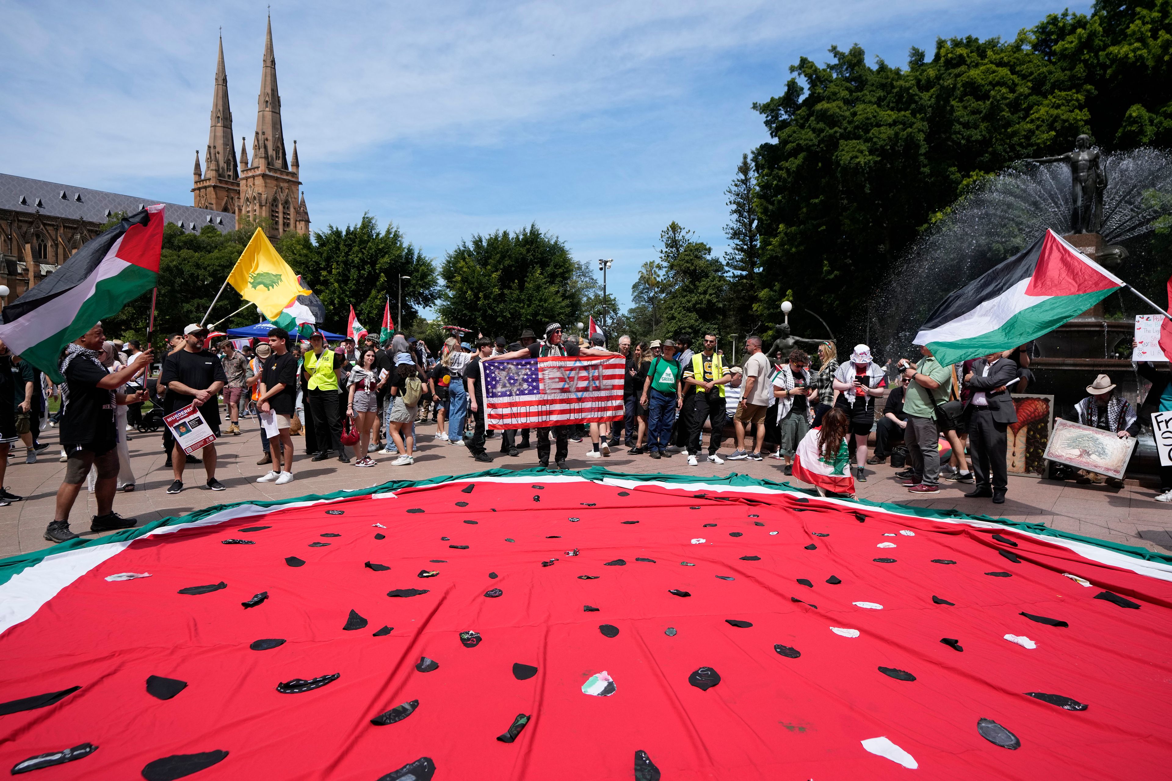 Pro-Palestinian supporters rally in Sydney, Sunday, Oct. 6, 2024. (AP Photo/Rick Rycroft)