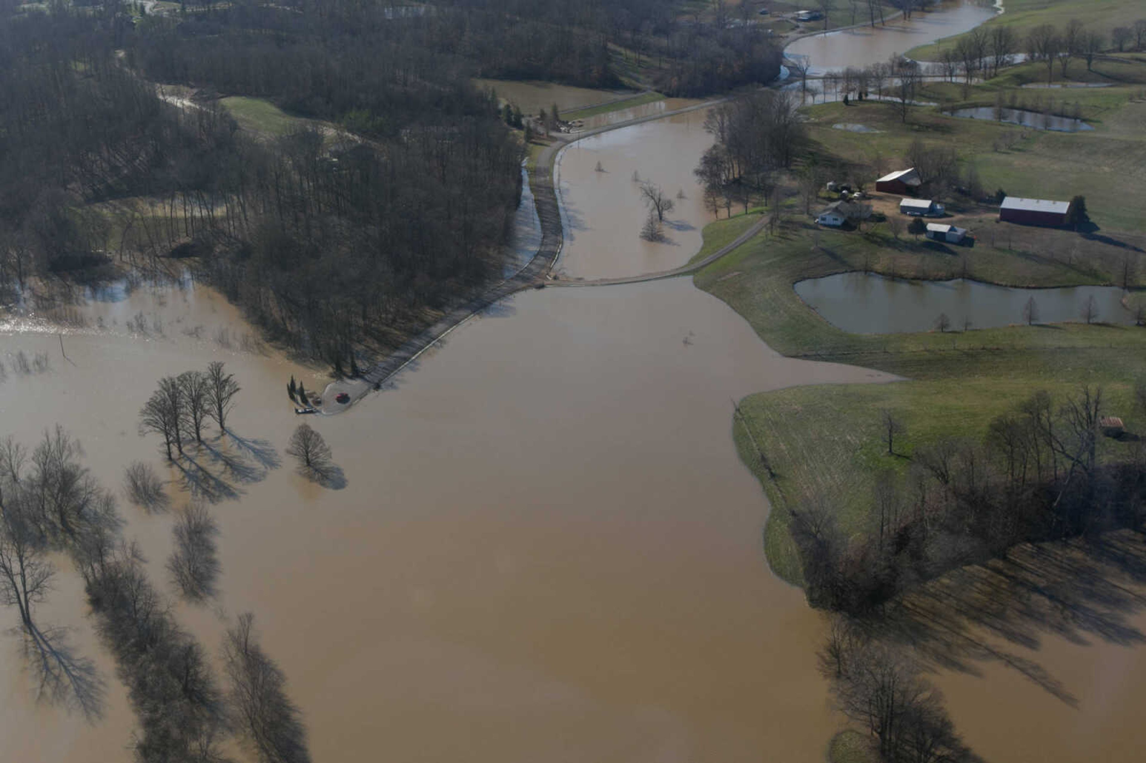 GLENN LANDBERG ~ glandberg@semissourian.com

The swollen Mississippi River is seen a portion of Highway 177 and the surrounding areas in Cape Girardeau, Saturday, Jan. 2, 2016.