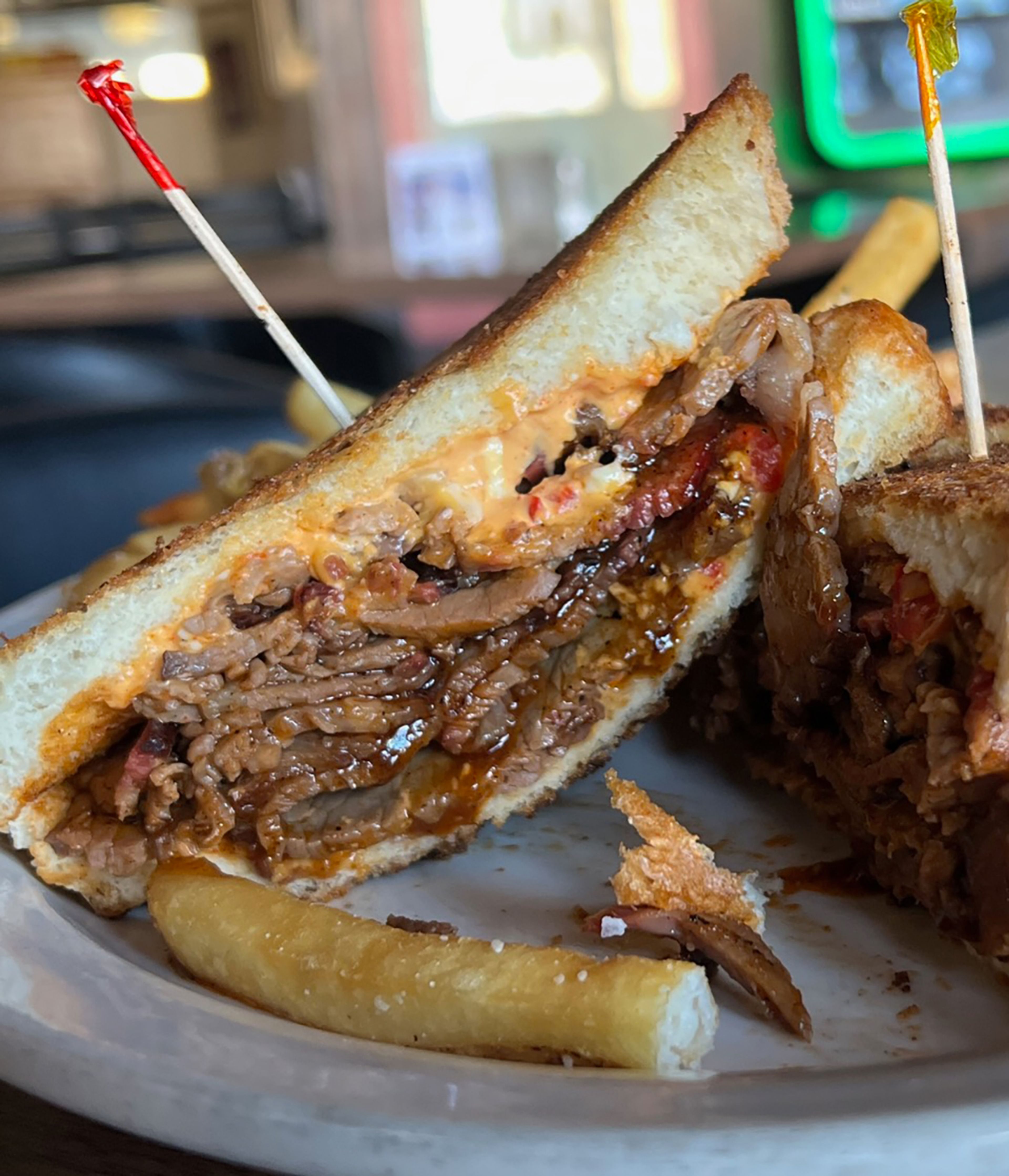 Port Cape's brisket & pimiento cheese sandwich is a delectable classic by any standard.