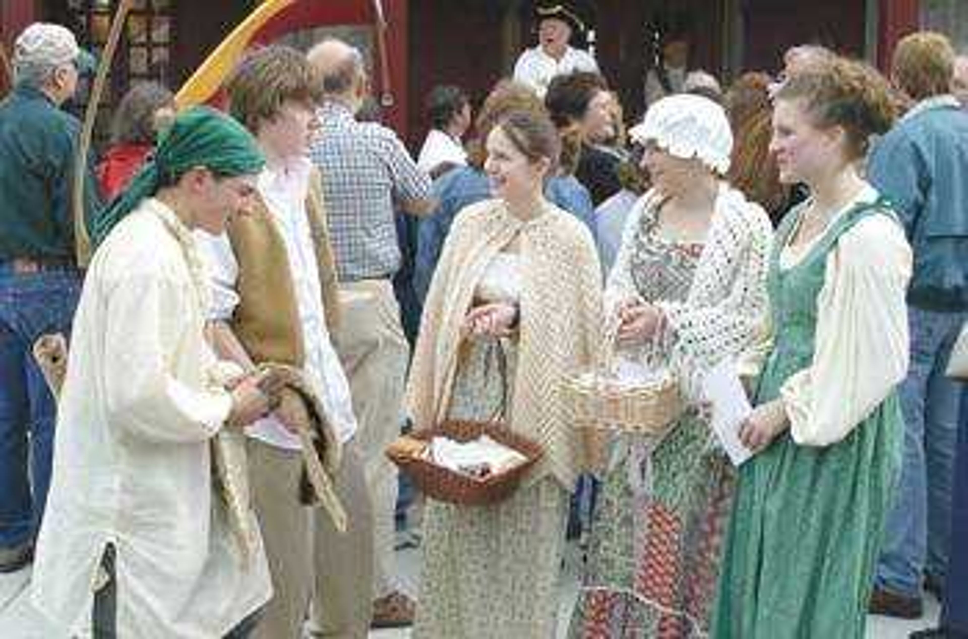 From left, Josh Bohnert, Joe Baumann, Aimee Brown, Lauren Cook, and Kathleen Mulcrone, played the part of early settlers.