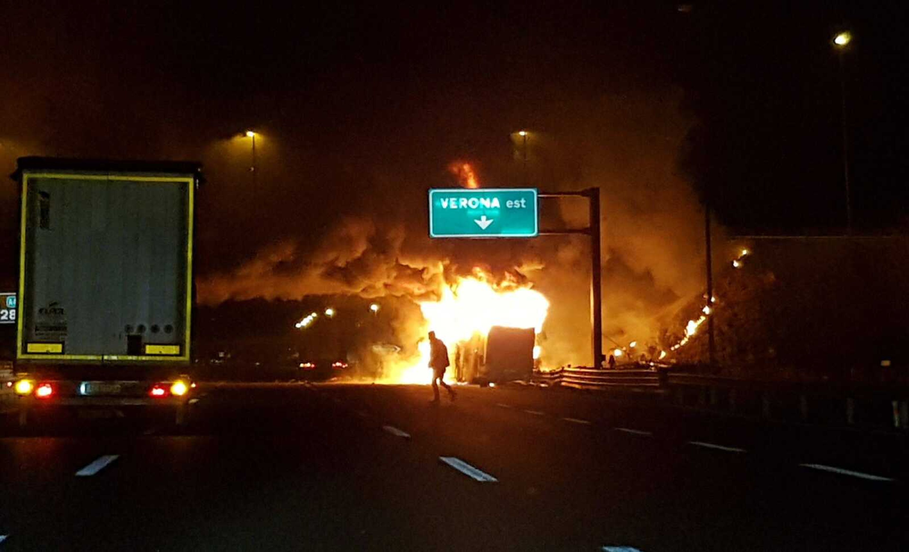 Flames engulf a bus that crashed late Friday near Verona, northern Italy. Police say 16 people died when the bus carrying Hungarian school students returning home from France crashed into the side of a highway.