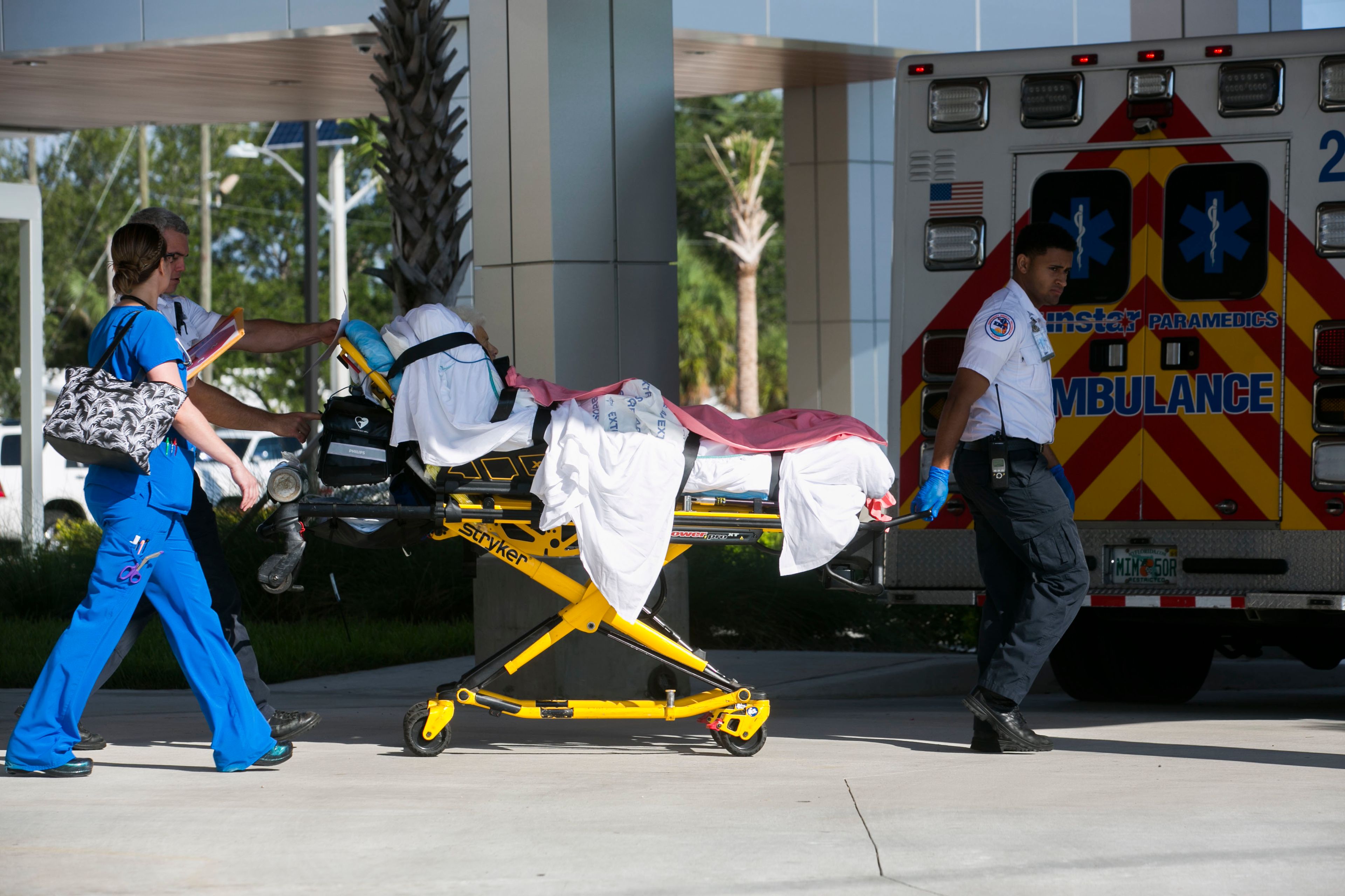 FILE - Patients are evacuated from Palms of Pasadena Hospital in South Pasadena, Fla. on Friday, Sept. 8, 2017, as Hurricane Irma approaches. (Eve Edelheit/Tampa Bay Times via AP, File)