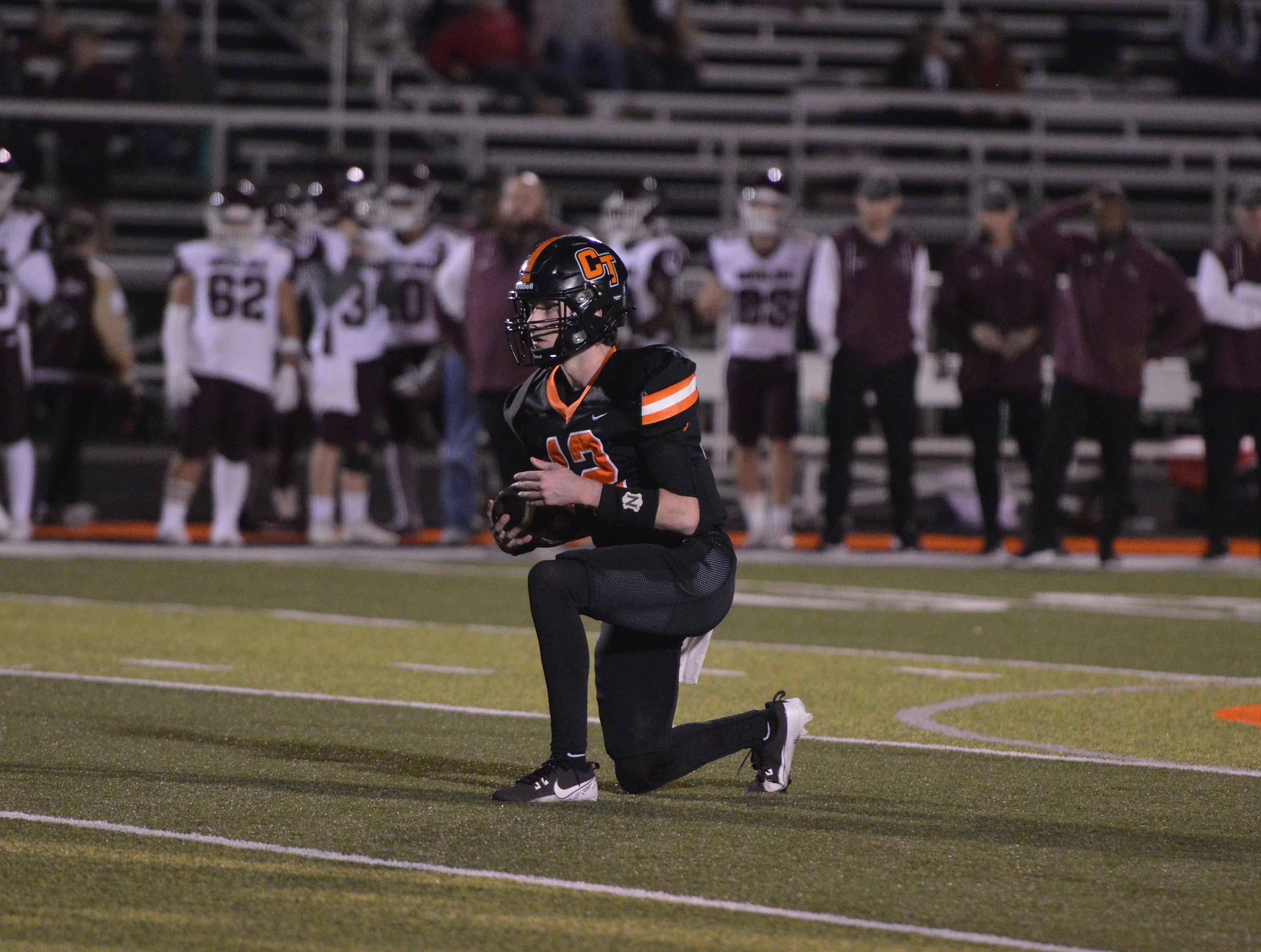 Cape Central quarterback Deklin Pittman takes the final kneel down to cement a 28-21 district semifinal win over Poplar Bluff on Friday, Nov. 8.