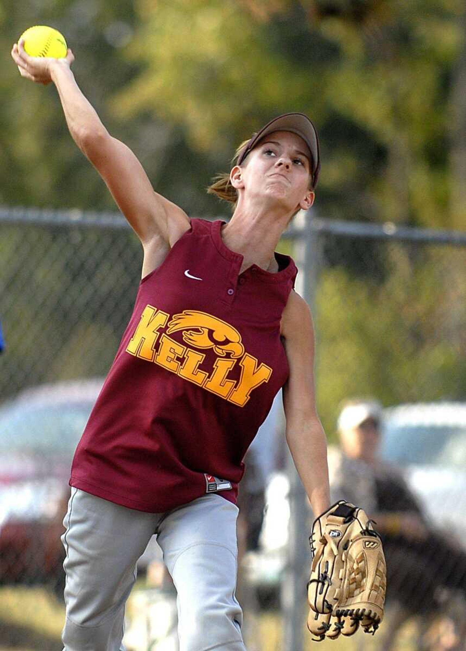 Kelly third baseman Haley Glastetter throws to first for an out after fielding a ground ball during the third inning.