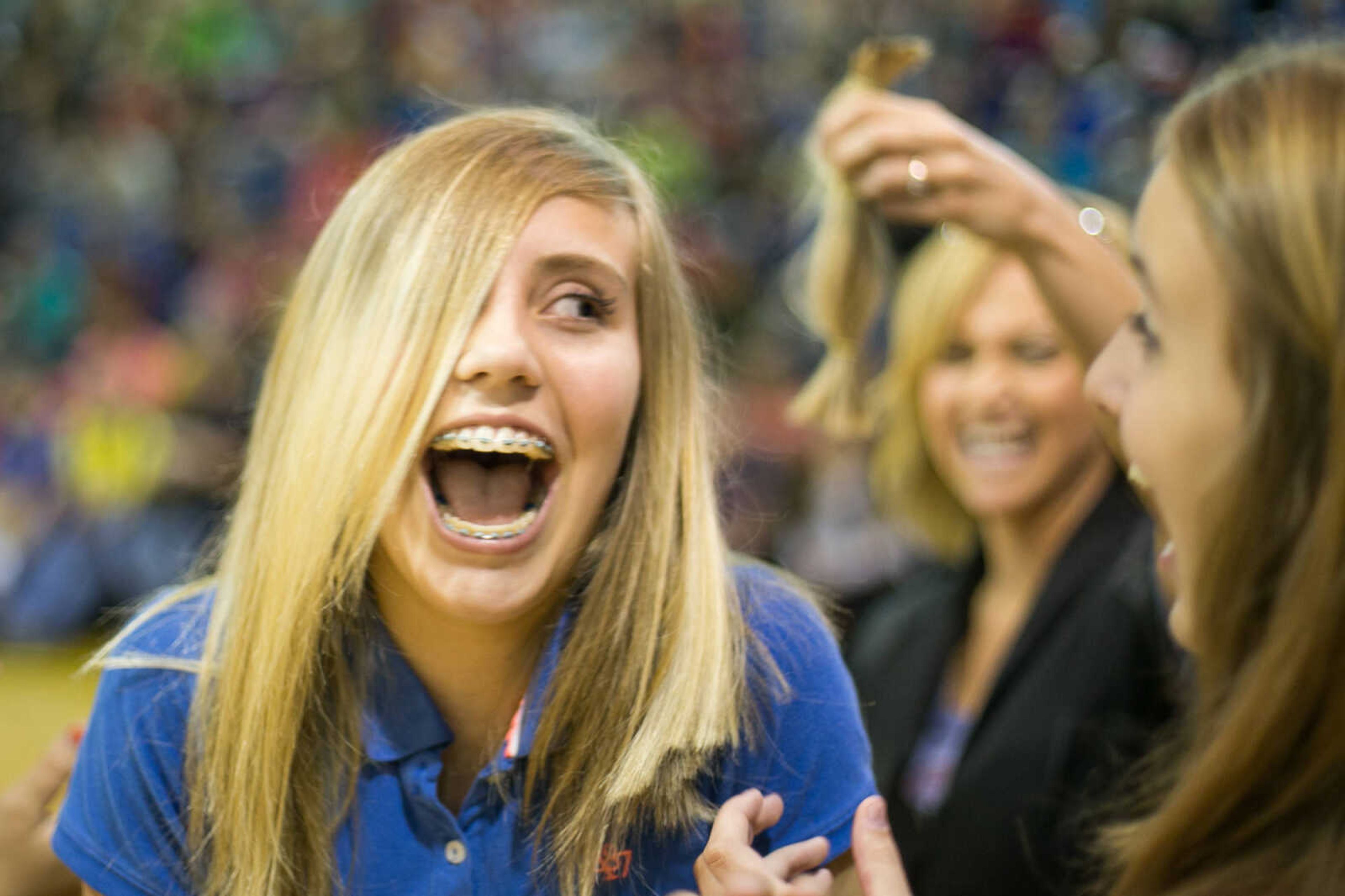 GLENN LANDBERG ~ glandberg@semissourian.com

Diamond Ham reacts after having her ponytail cut and donated to the Beautiful Lengths program Monday, May 18, 2015 at Scott City High School. Twenty-four students and teachers participated in the event that provides wigs to cancer patients across the country.