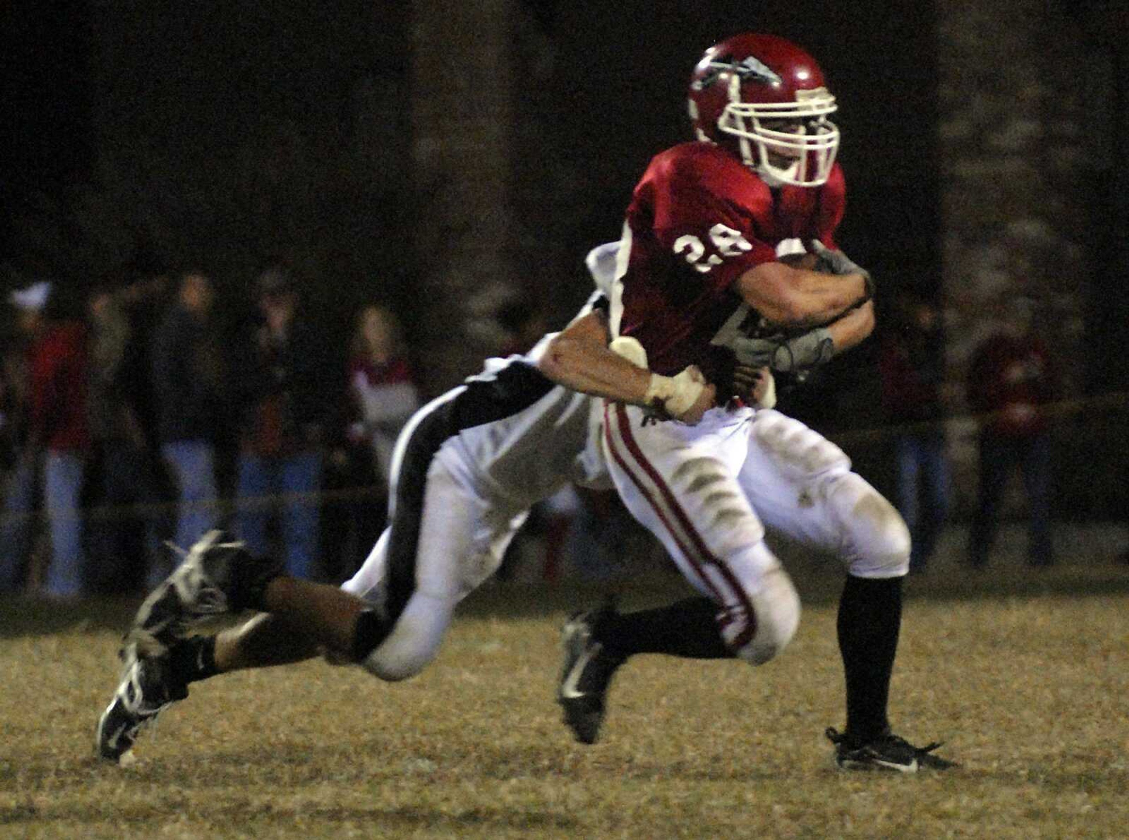 ELIZABETH DODD ~ edodd@semissourian.com
Jackson's Mitchell McCulley gains some yards in the second quarter against Farmington in a Jackson loss 42-38 at Jackson Friday. McCulley was announced to be homecoming king at the game.