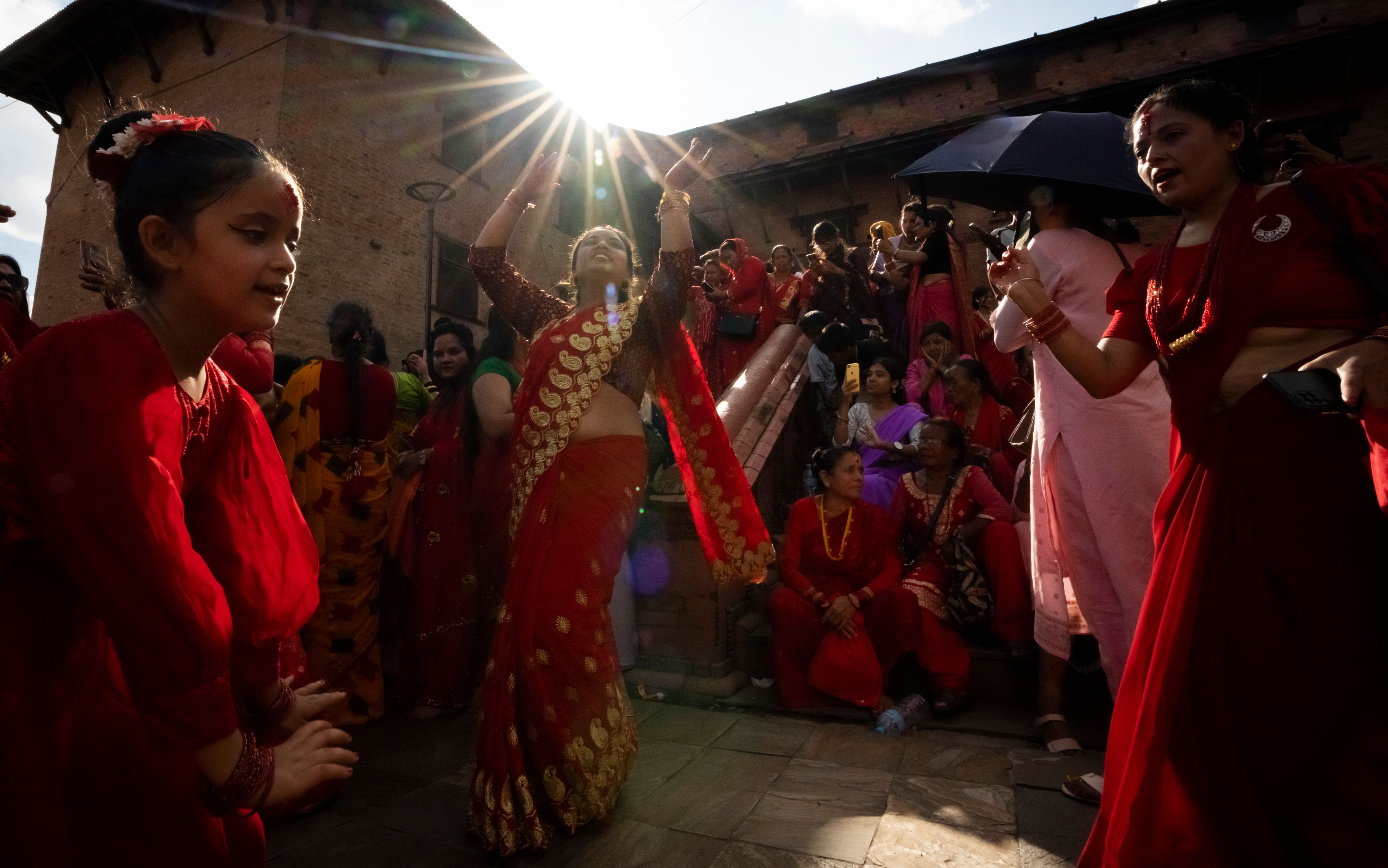 Nepalese women dance at the Pashupatinath temple during Teej festival celebrations in Kathmandu, Nepal, Friday, Sept. 6, 2024. (AP Photo/Niranjan Shrestha)