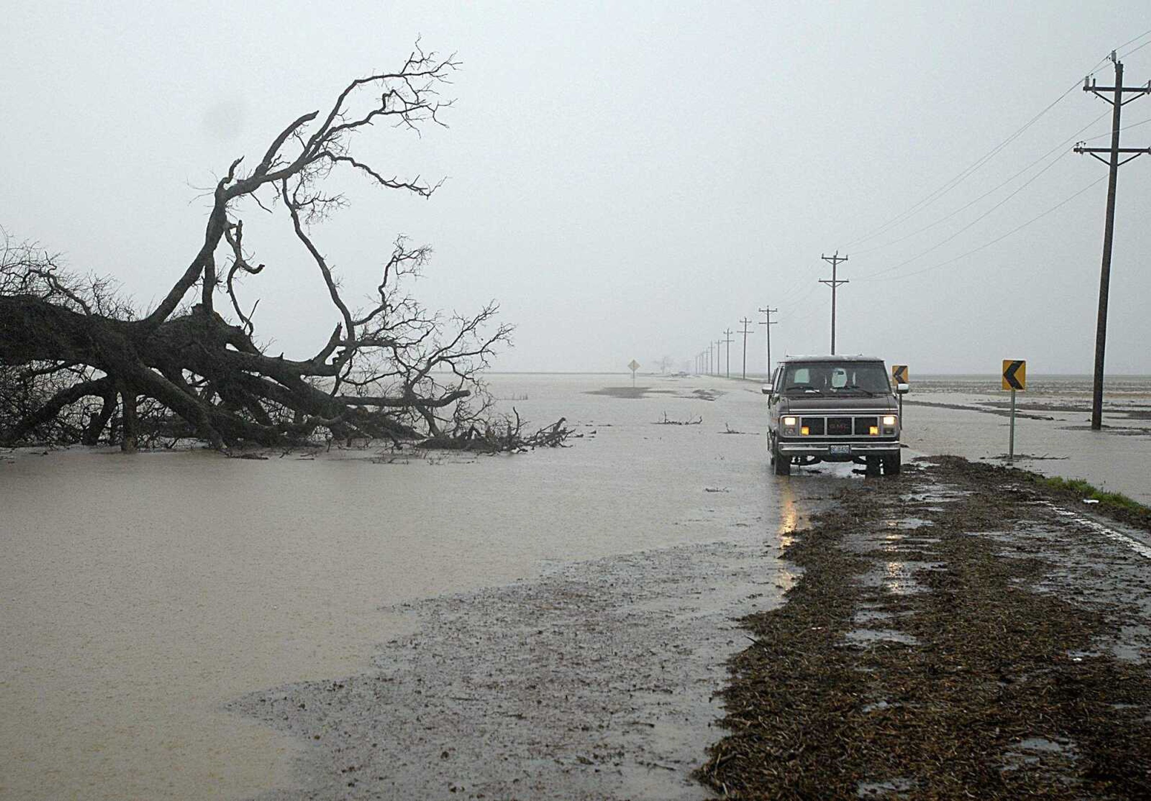 AARON EISENHAUER ~ aeisenhauer@semissourian.com
Scott Hayden's van sets stalled after he passed through flood water on Route EE outside Delta on Tuesday, March 18, 2008.