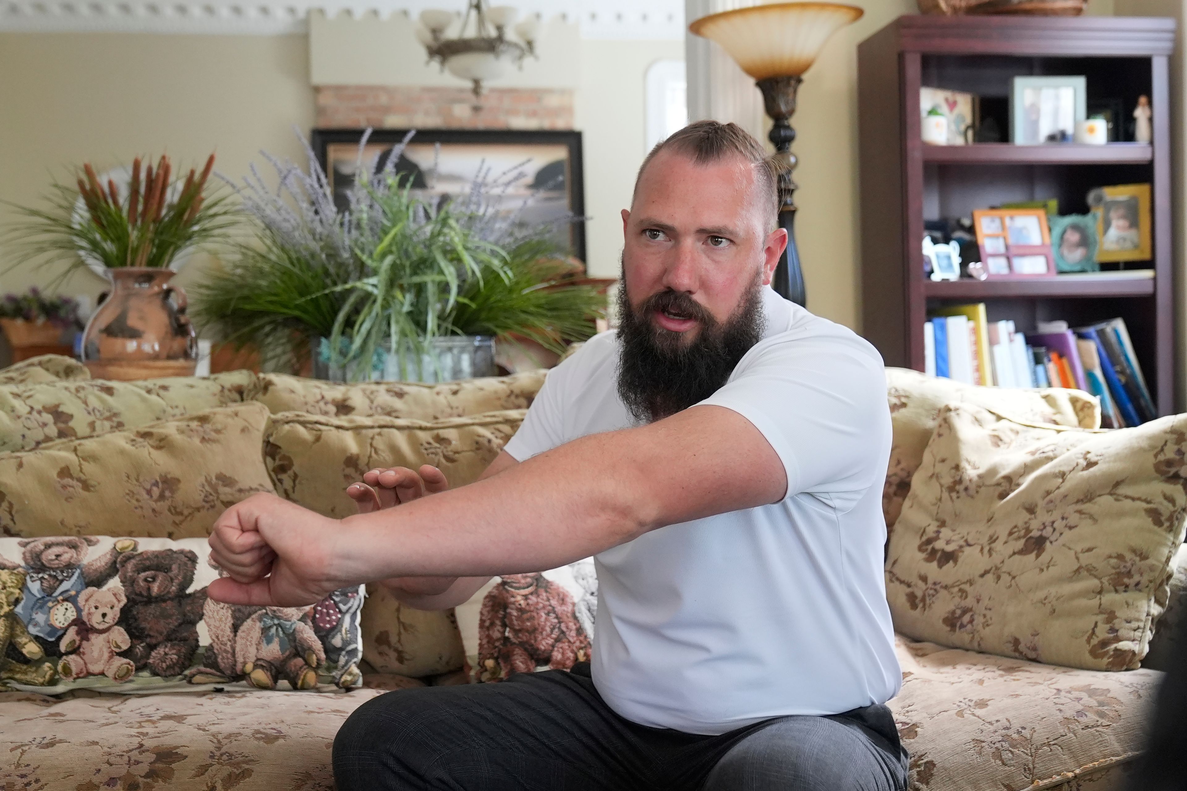 Ben Powell, who drives a truck as a civilian DoD contractor, said he felt a professional responsibility to report Chris Arthur after watching his videos, during an interview in Salt Lake City, on July 19, 2024. (AP Photo/Rick Bowmer)