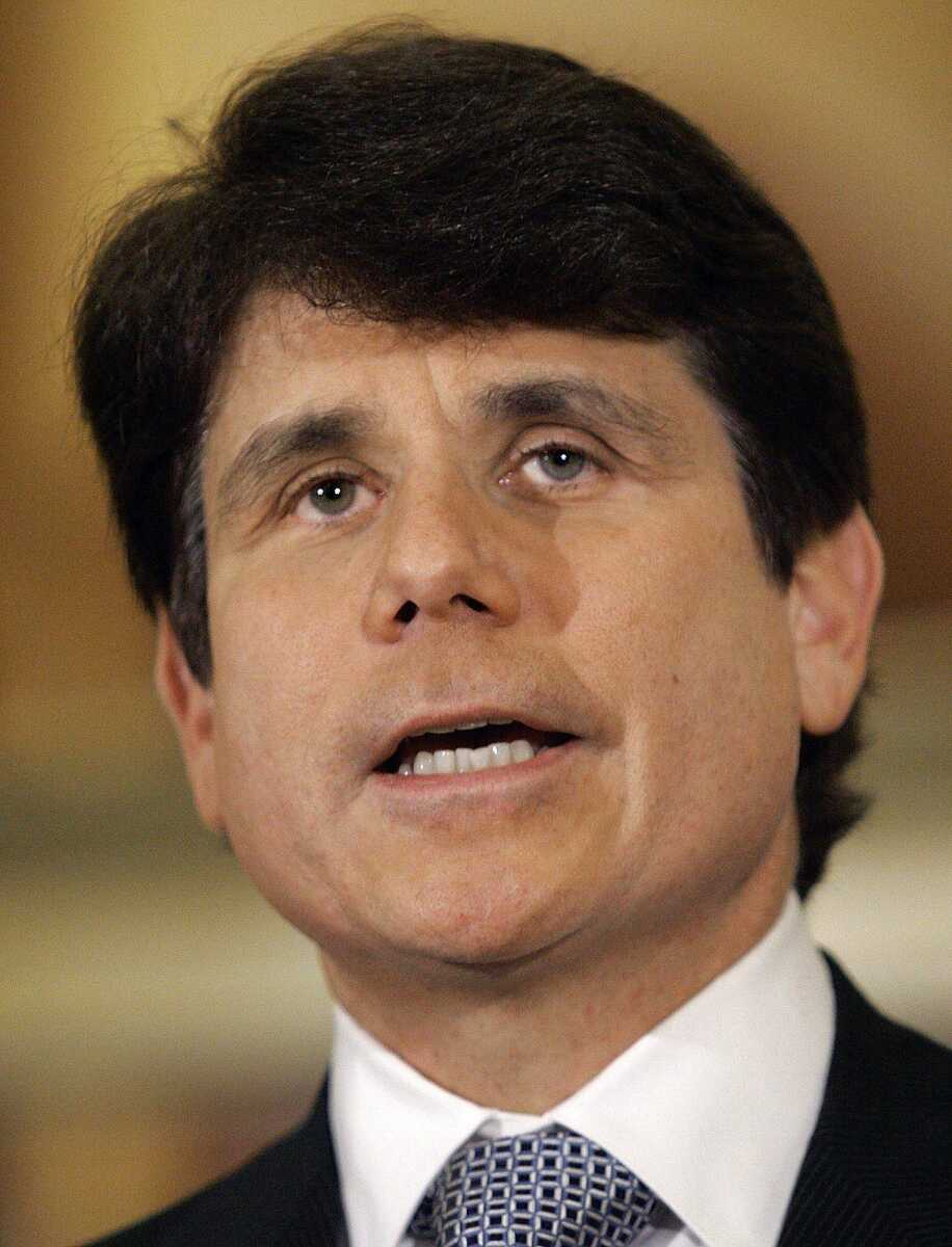 Illinois Gov. Rod Blagojevich speaks to reporters after mass transit funding legislation passed in both the Senate and House at the Capitol in Springfield, Ill., Thursday, Jan. 17, 2008. (AP Photo/Seth Perlman)