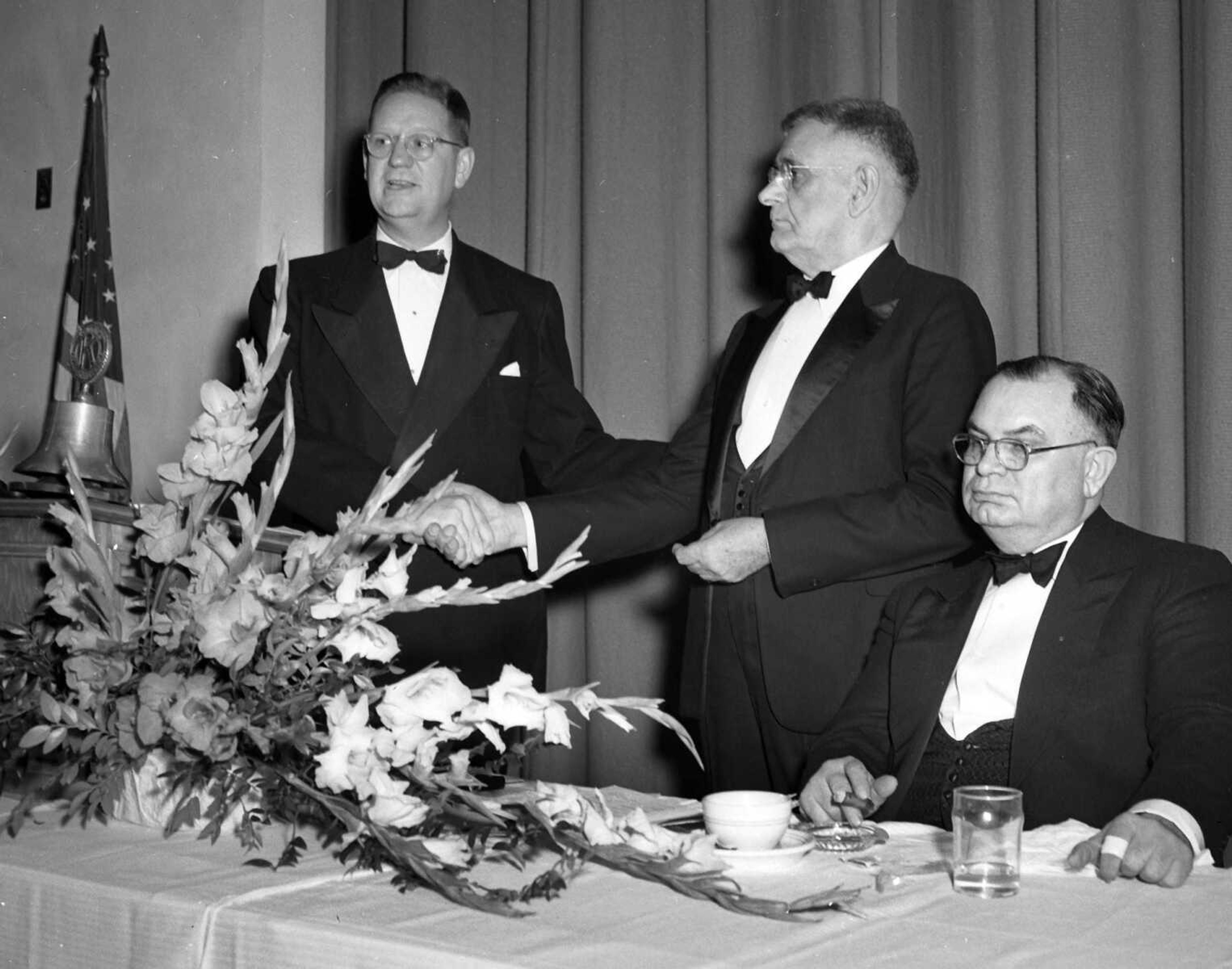 Help us identify these gentlemen at a Kiwanis event. Ron Grebing wrote: "I'm pretty sure that the man on the left on photos 1 and 2 is Carlton Lorberg who operated Lorberg Funeral Home and Lorberg Appliance, both located on S. Sprigg."