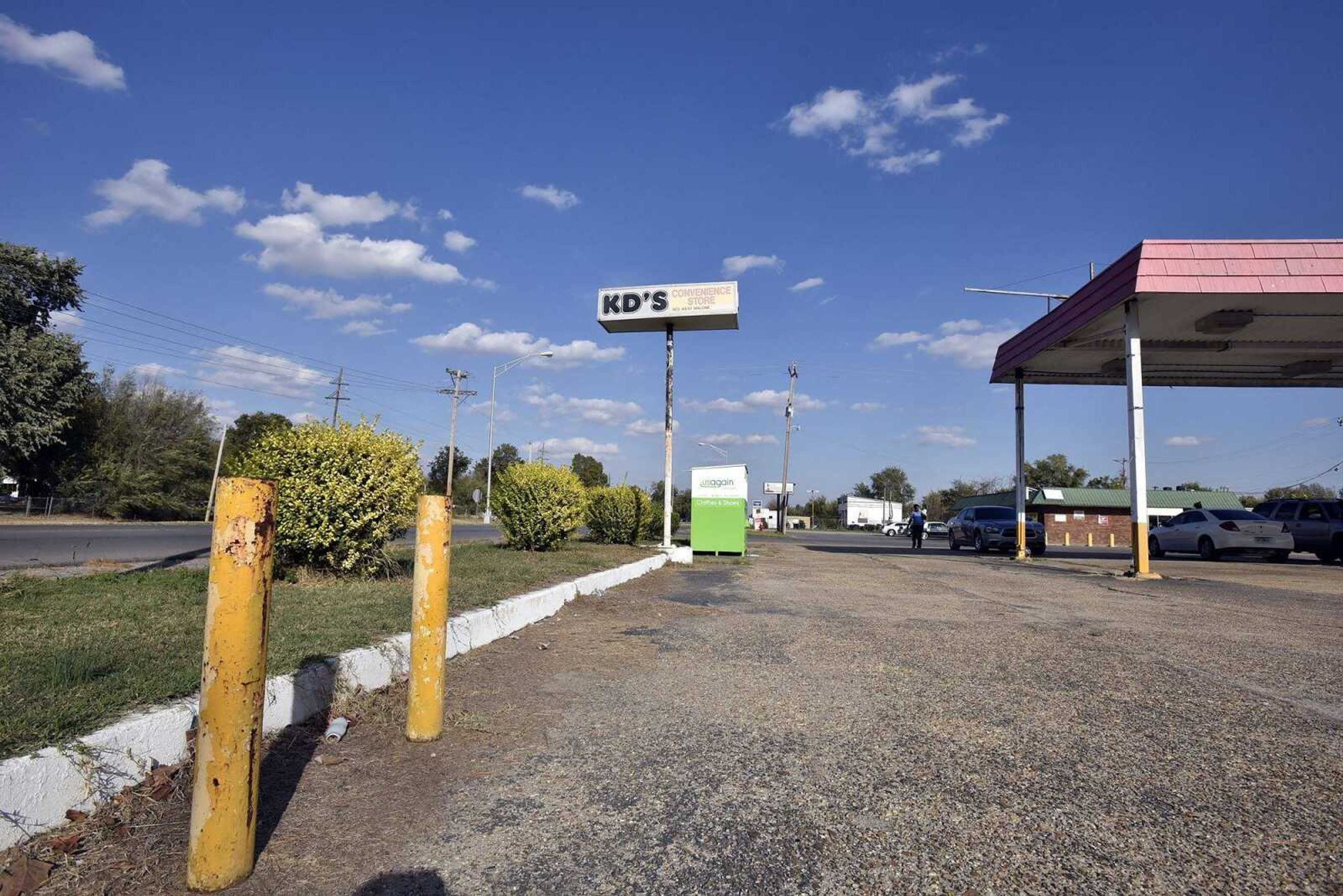 
Two yellow poles are all that remain from where a pay phone once stood off of W. Malone Ave. near Branum Ave. in Sikeston, Missouri.