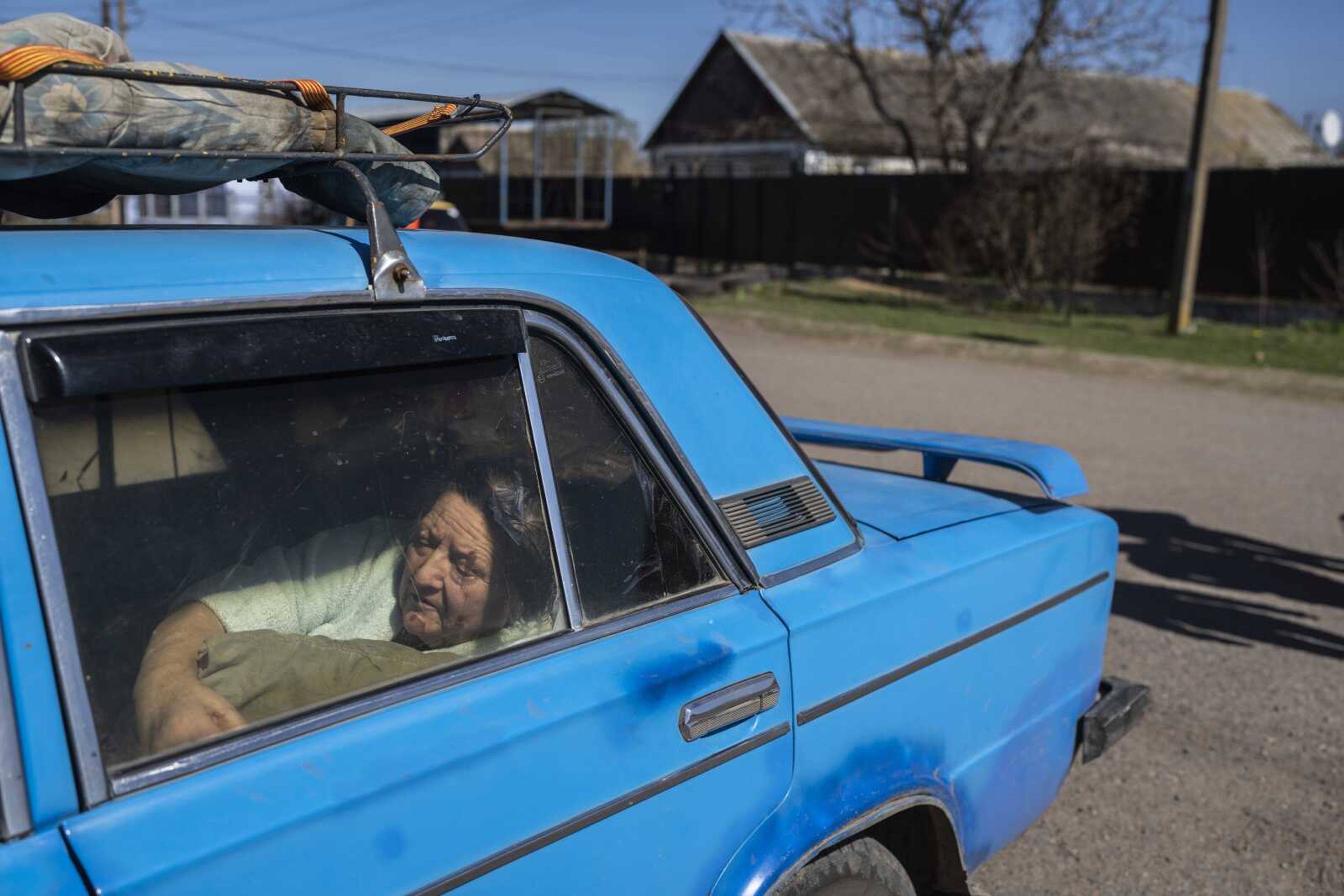 Ludmina Starodubets, 71, arrives Thursday at the city of Bashtanka, after fleeing from Pavlo-Marianovka village in Mikolaiv district, Ukraine, which was attacked by the Russian army two days earlier.