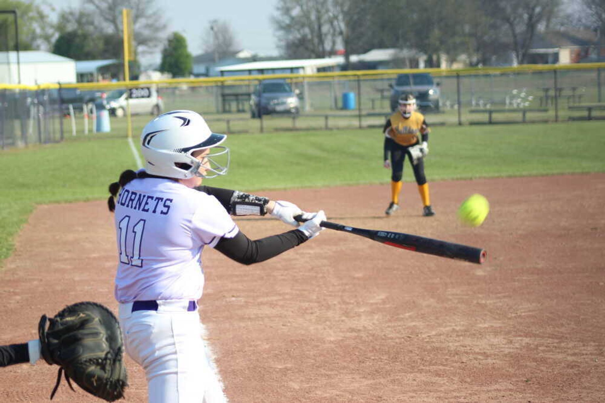 Lady Hornet Jules Gurley connects at the plate. Photo by Steve Hankins