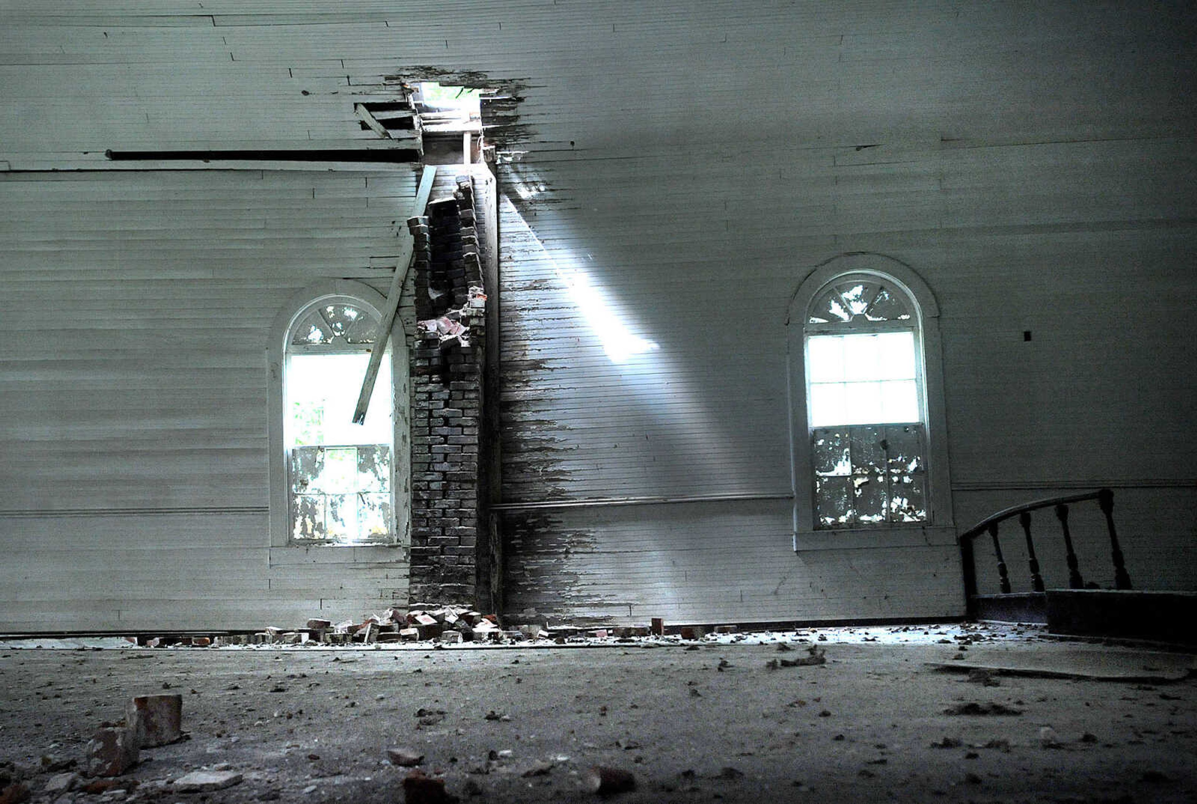 LAURA SIMON ~ lsimon@semissourian.com

Light shines into the interior of McLain's Chapel through a hole in the ceiling, Wednesday, May 28, 2014.