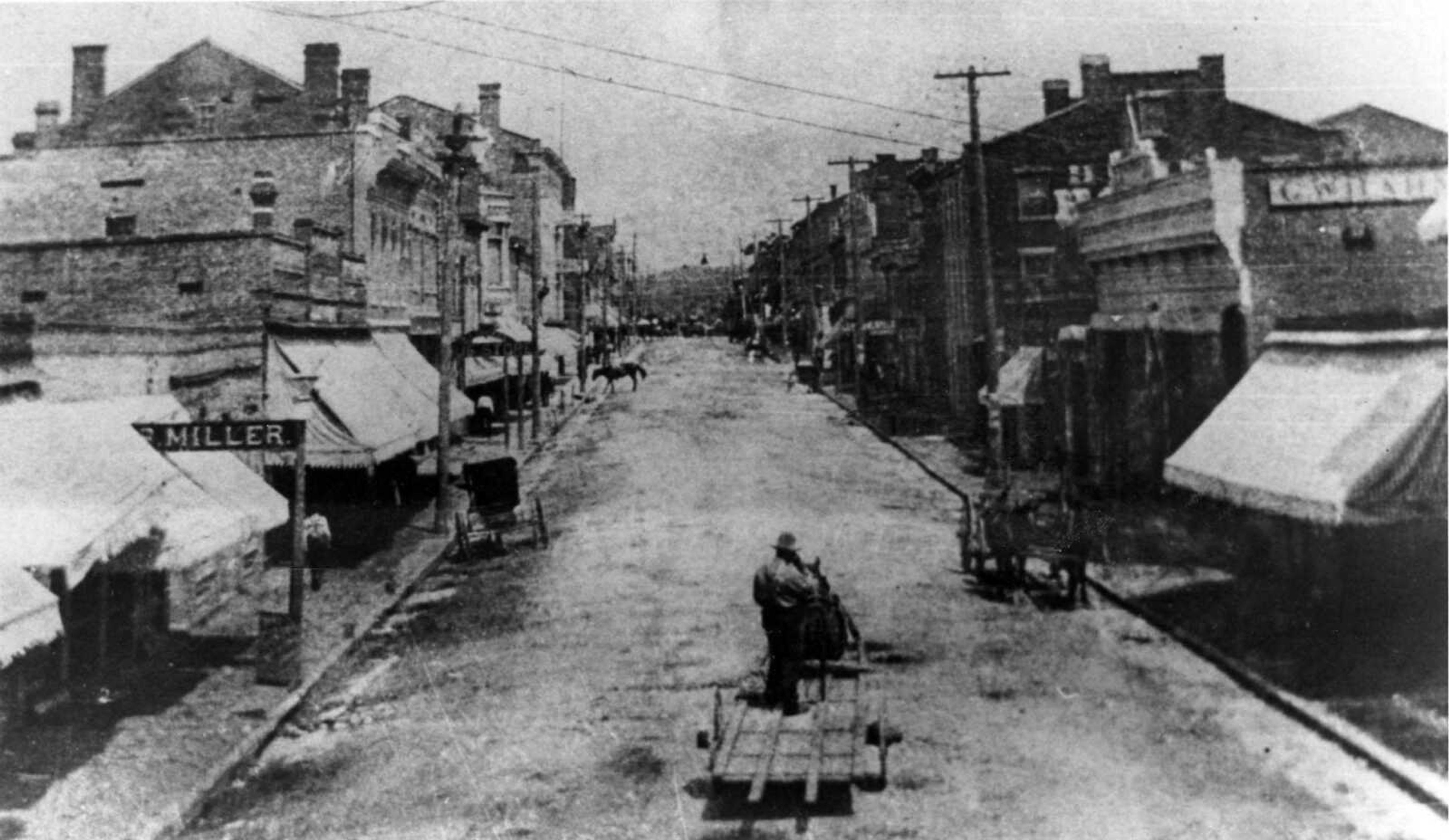 Main Street, looking north from Independence Street. Photo published in 1906 City Directory. (River Heritage Museum photo)