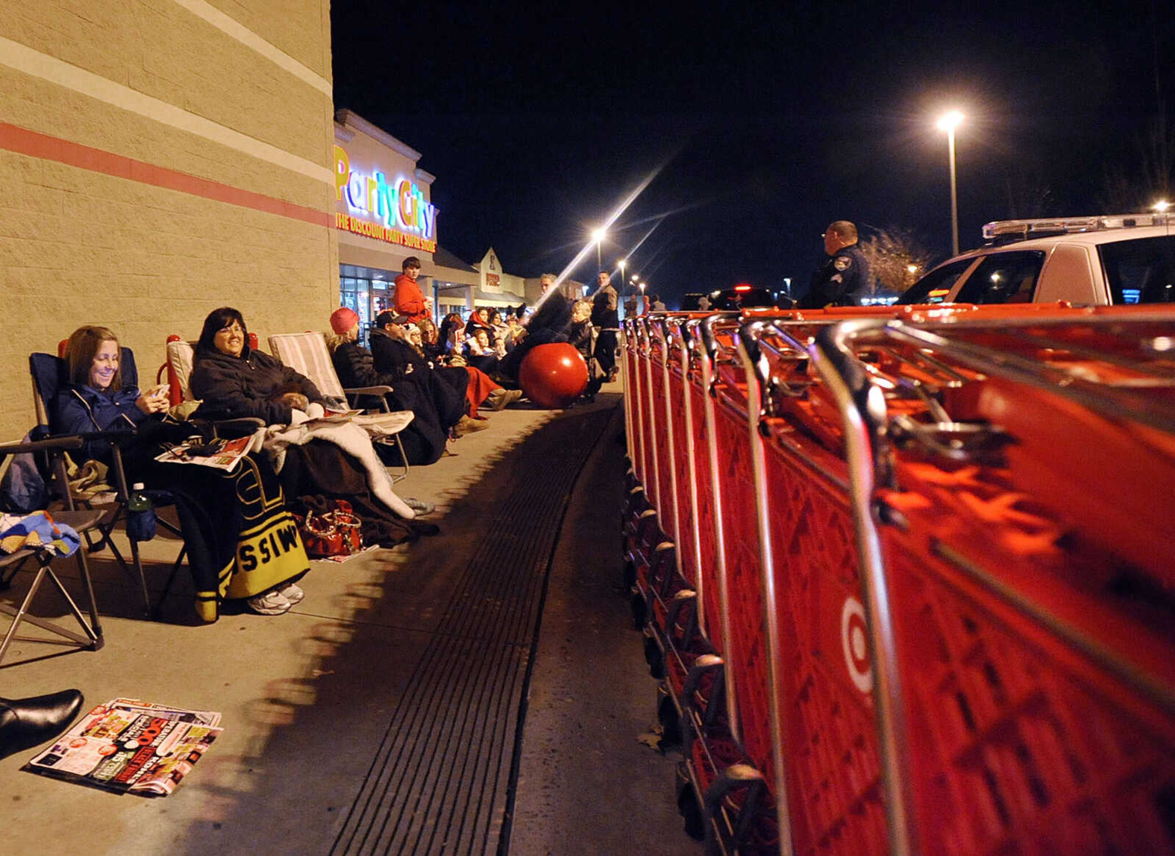 LAURA SIMON ~ lsimon@semissourian.com
Deal seekers set up camp outside of Target Thursday evening, Nov. 22, 2012 Cape Girardeau. The retailer opened it's doors at 8p.m. on Thanksgiving.