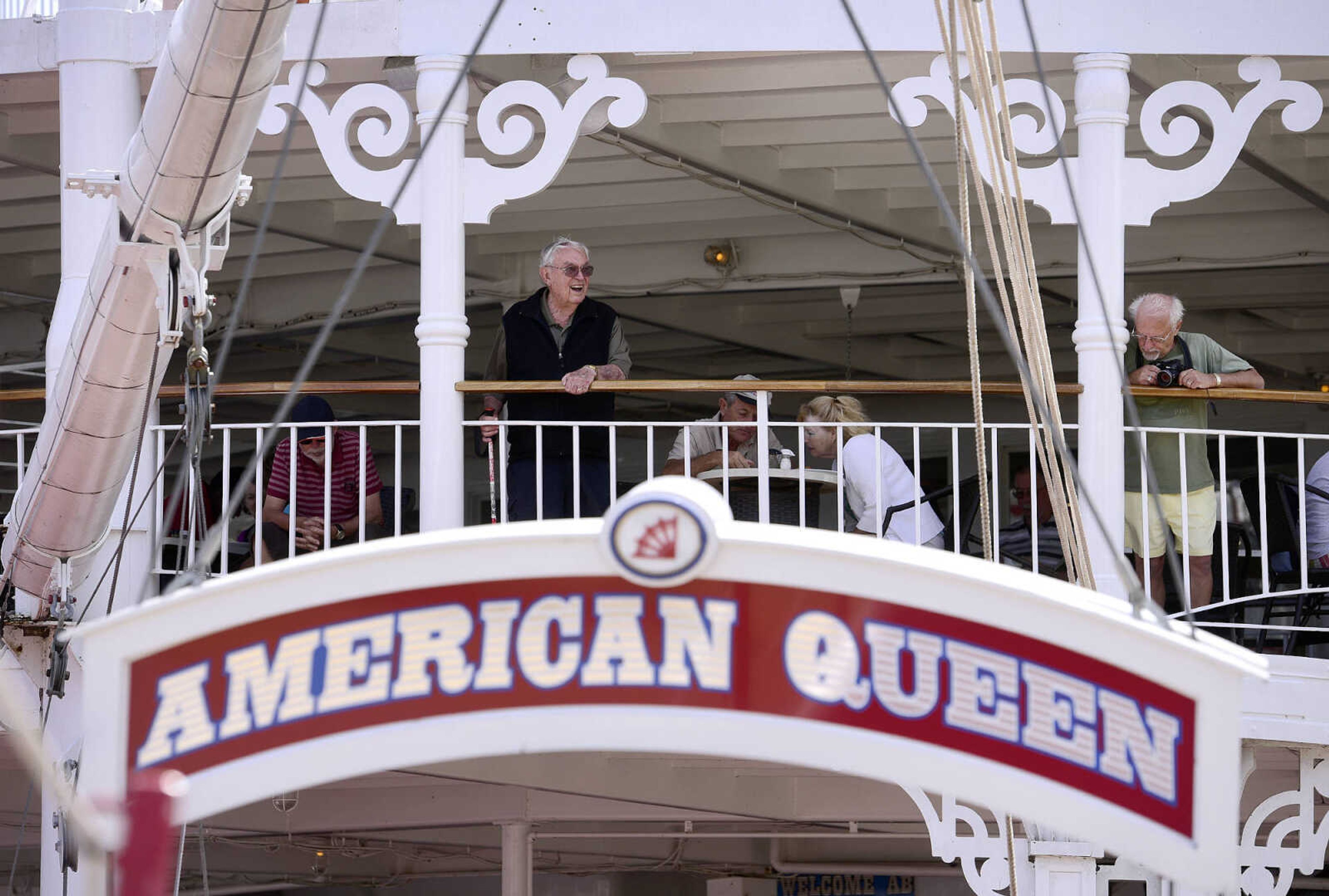 Passengers on the American Queen take in the from the deck as the riverboat prepares to depart Riverfront Park on Wednesday, Aug. 23, 2017, in downtown Cape Girardeau.