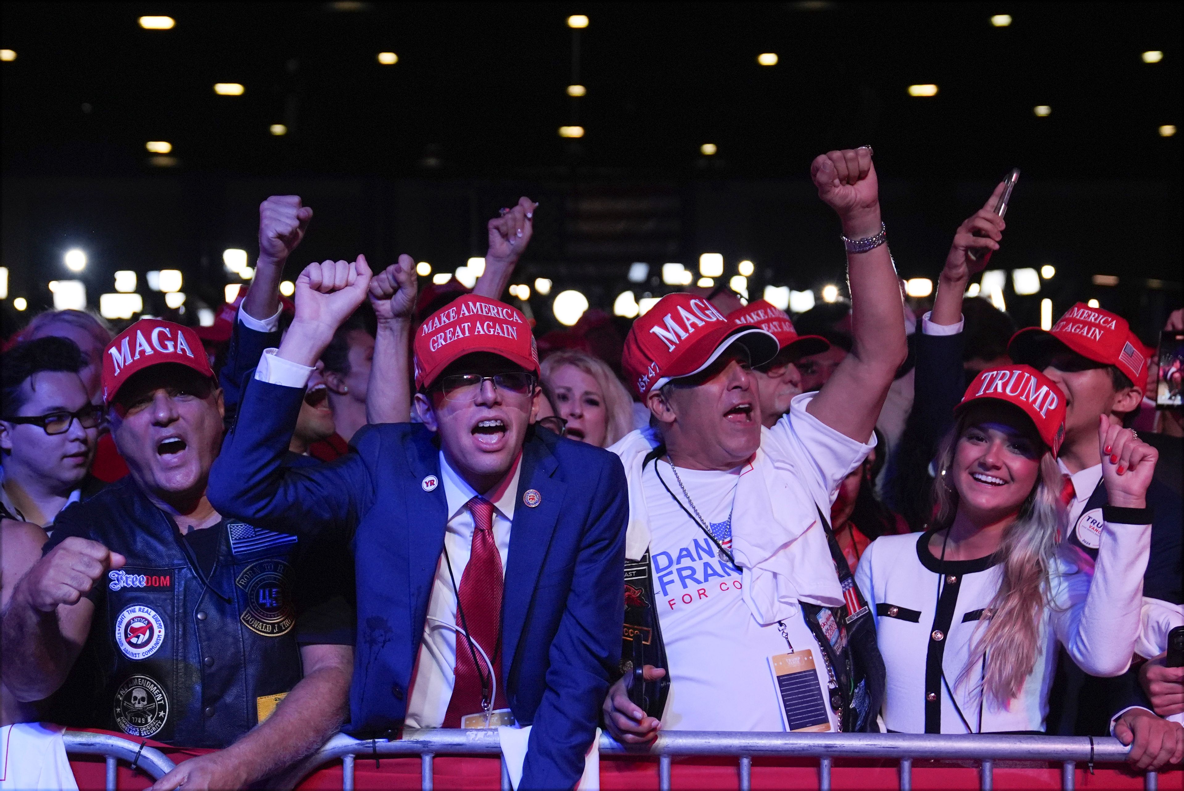 Supporters arrive at an election night watch party for Republican presidential nominee former President Donald Trump Tuesday, Nov. 5, 2024, in West Palm Beach, Fla. (AP Photo/Evan Vucci)