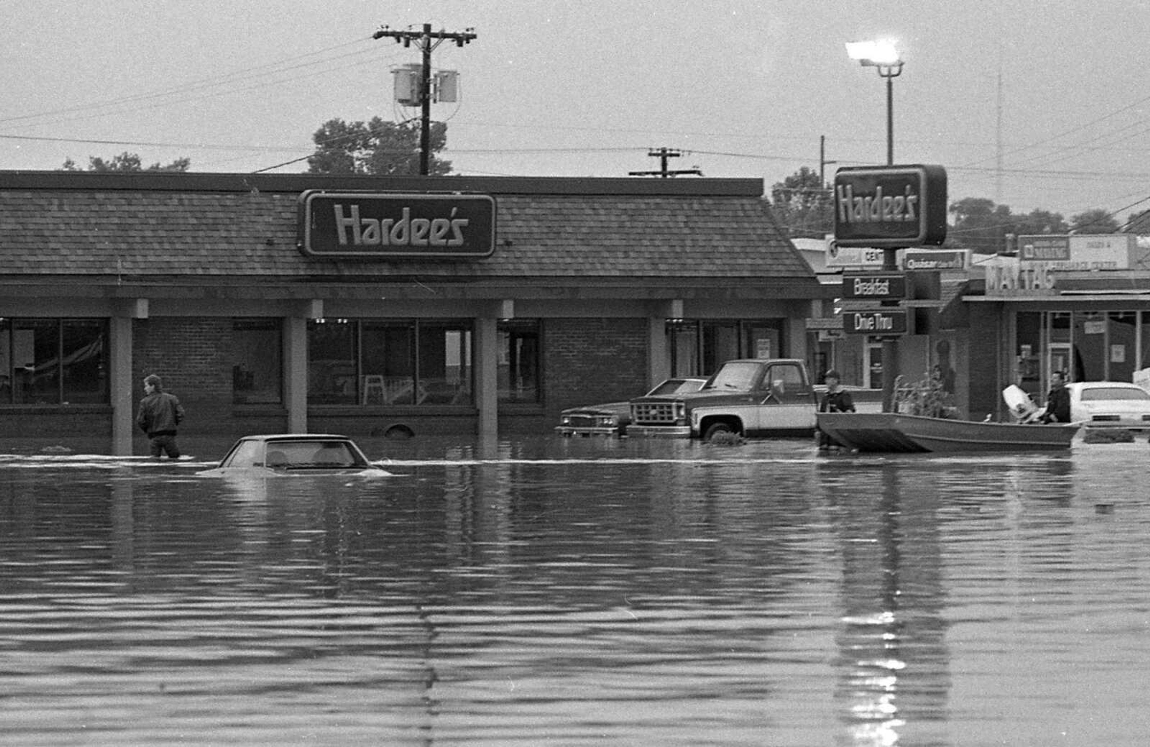 Floodwaters remained along William Street across from Town Plaza on May 16, 1986. (Southeast Missourian)