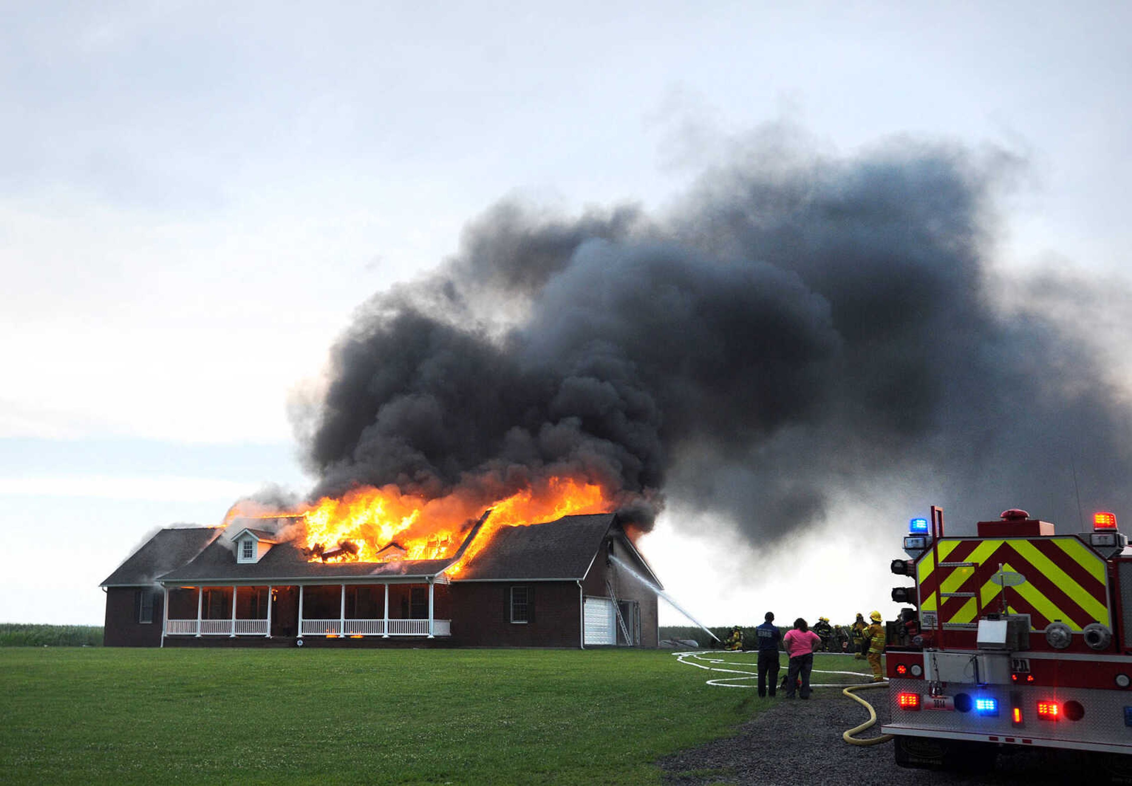 LAURA SIMON ~ lsimon@semissourian.com

Firefighters from Delta, Scott City, Chaffee and New Hamburg/Benton/Commerce battle a house fire off County Road 204 in Scott County Wednesday afternoon, July 23, 2014.