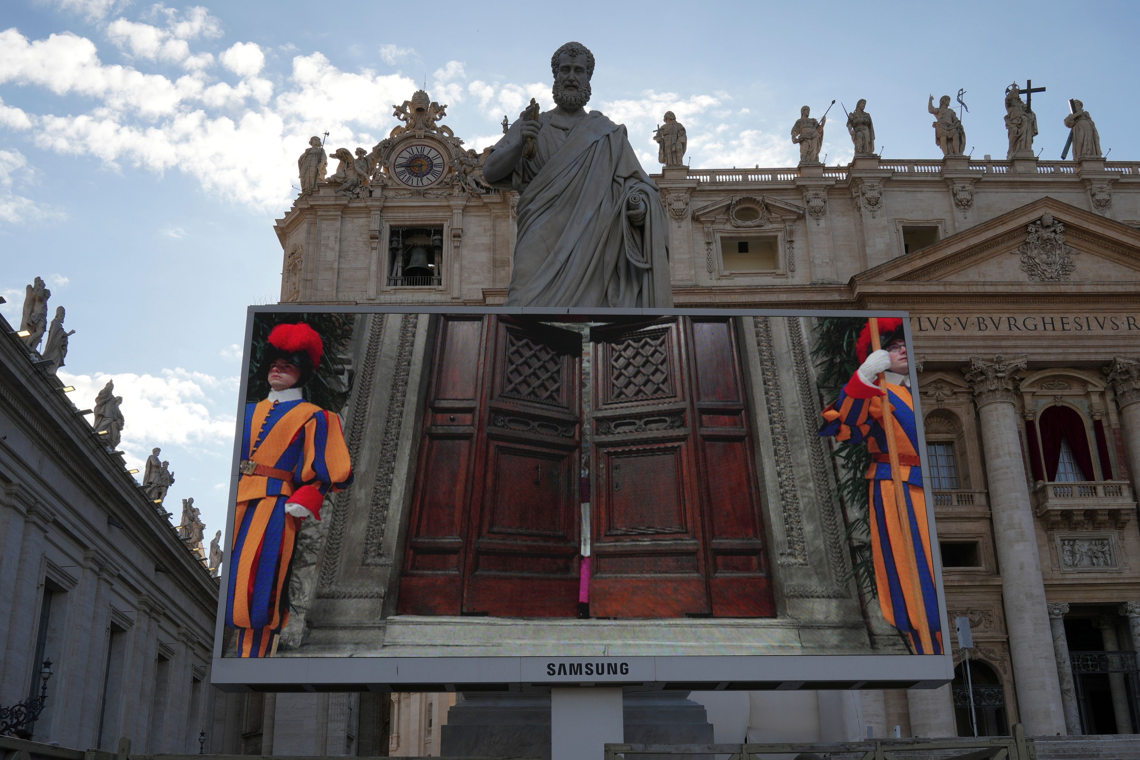 The conclave to elect a new pope officially begins as the doors to the Sistine Chapel close