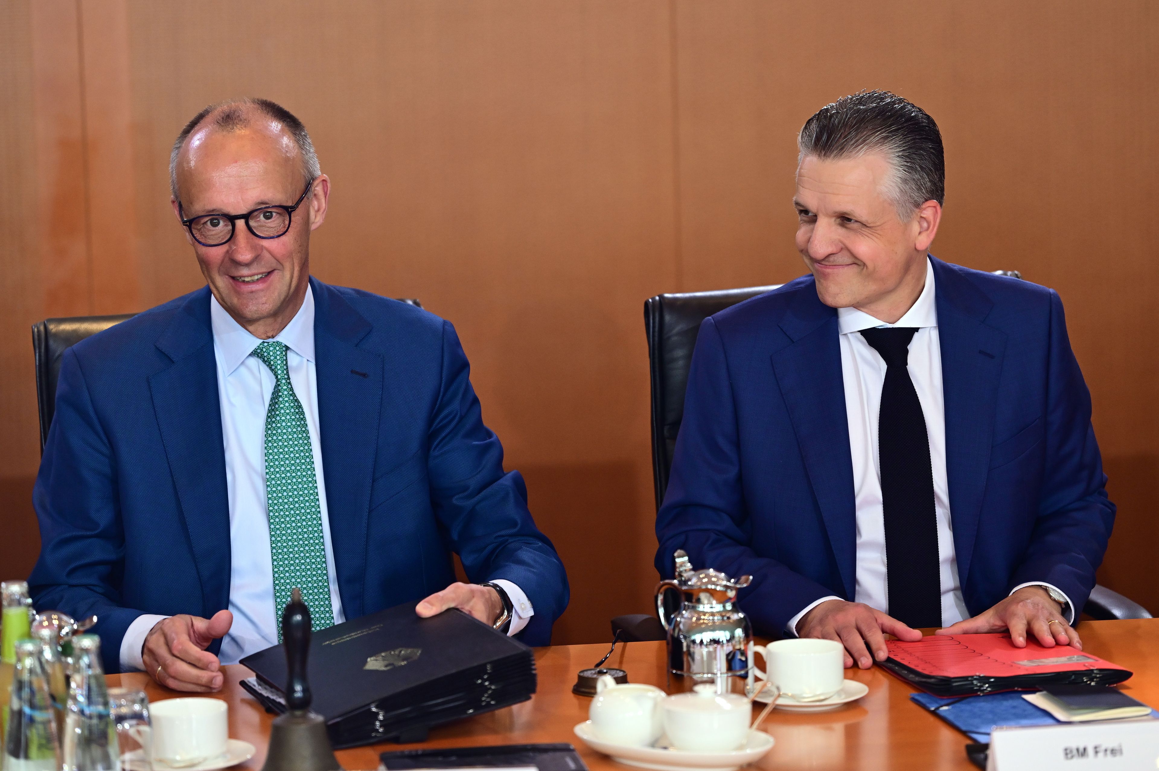 German leader Merz reshuffles top posts as he tries to count...