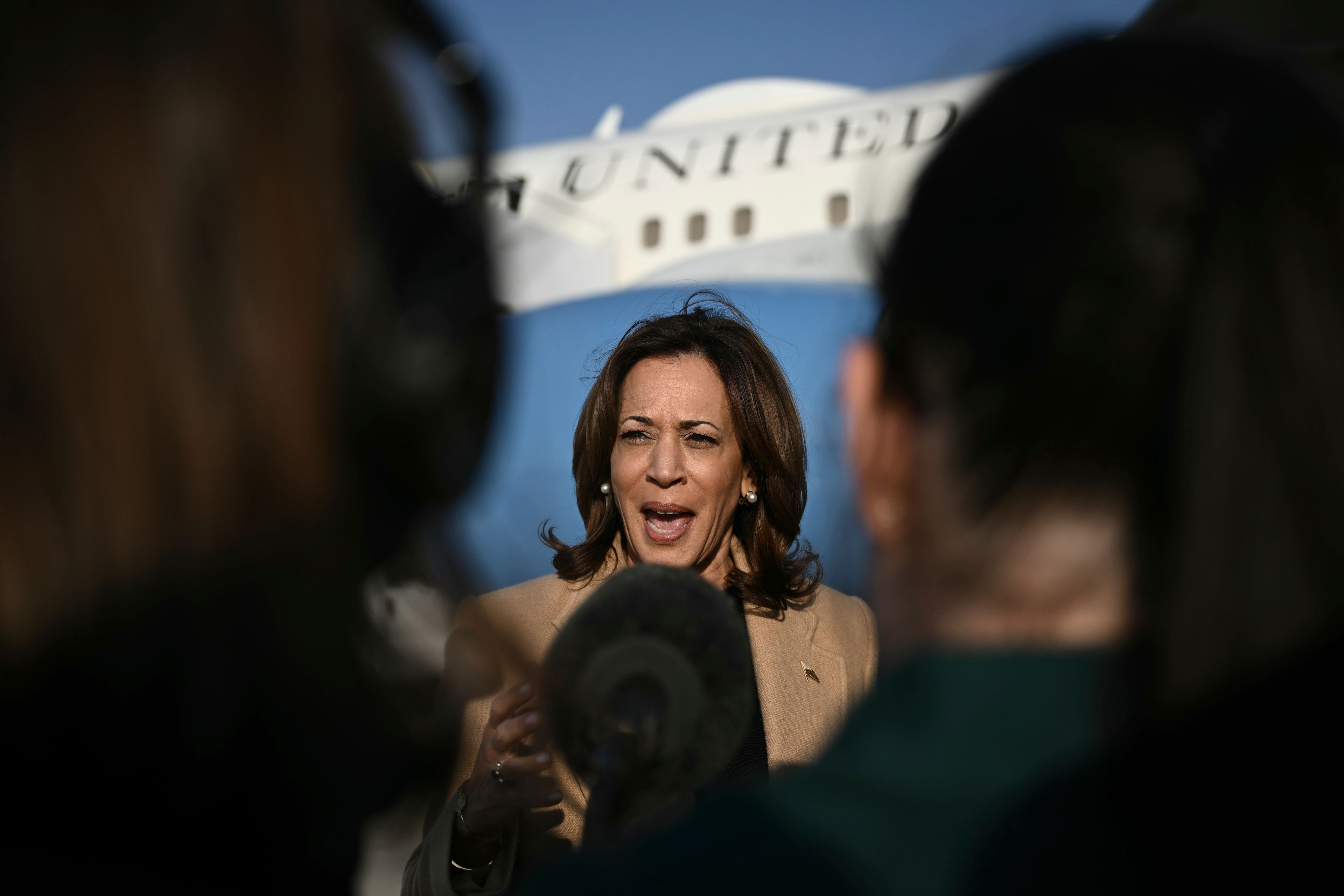 Democratic presidential nominee Vice President Kamala Harris speaks to the press before boarding Air Force Two at Joint Base Andrews, Md., Saturday, Oct. 12, 2024, en route to North Carolina for a campaign event. (Brendan Smialowski/Pool via AP)