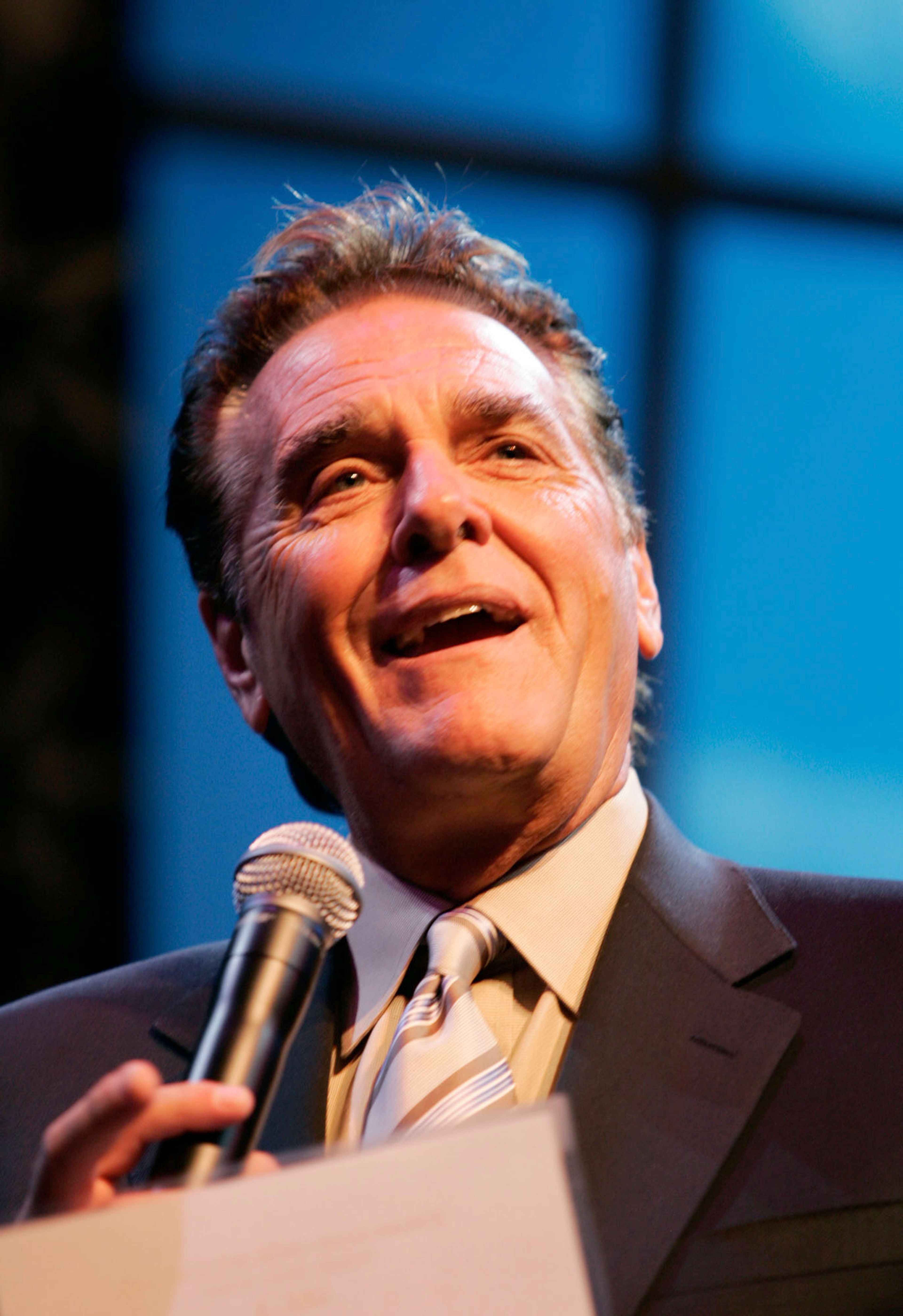 FILE - Chuck Woolery hosts a special premiere of the "$250,000 Game Show Spectacular" at the Las Vegas Hilton Saturday, Oct. 13, 2007, in Las Vegas. (Ronda Churchill/Las Vegas Review-Journal via AP, File)