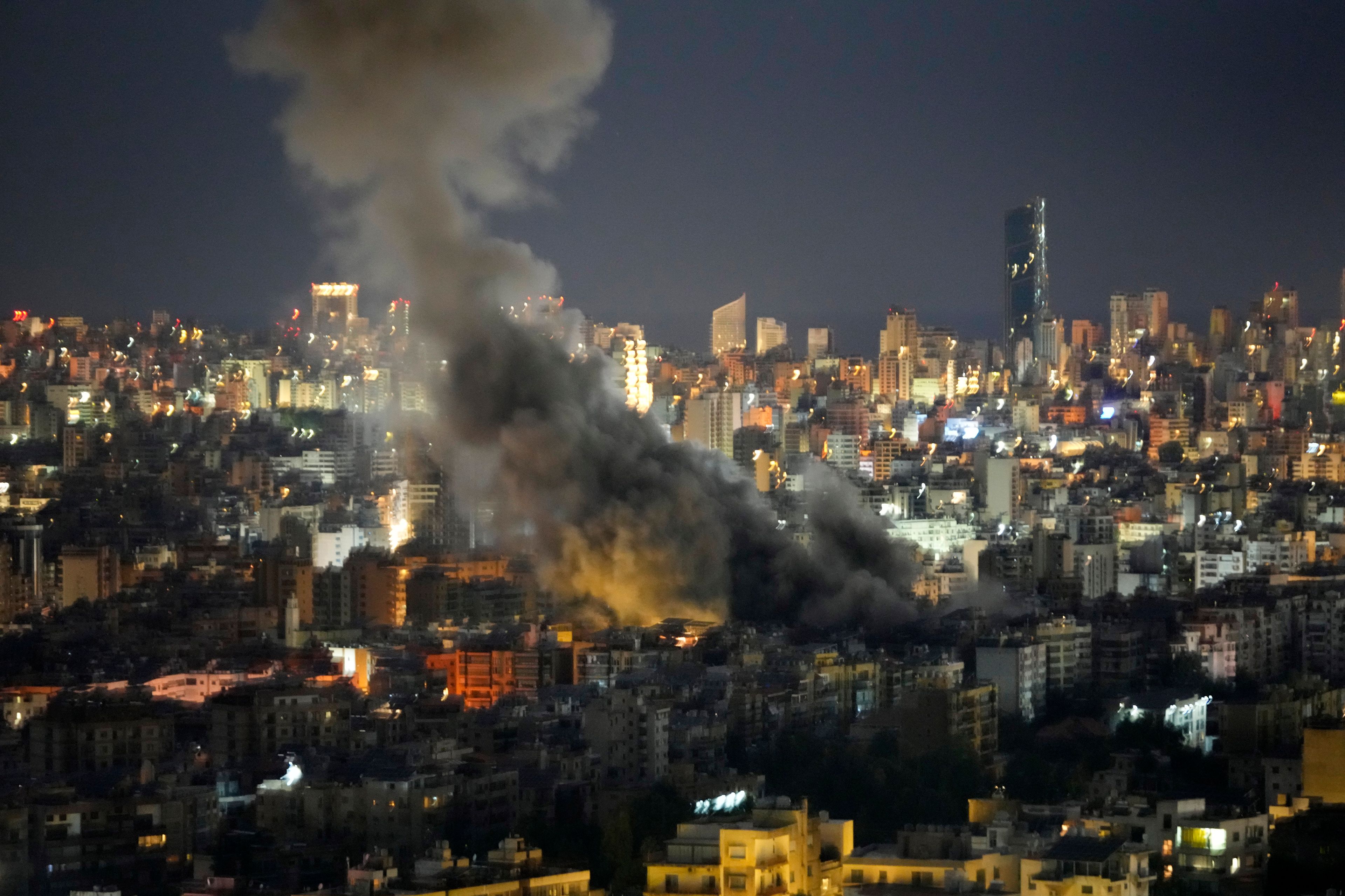 Smoke rises from an Israeli airstrikes on Dahiyeh, in the southern suburb of Beirut, Lebanon, early Sunday, Oct. 20, 2024. (AP Photo/Hussein Malla)