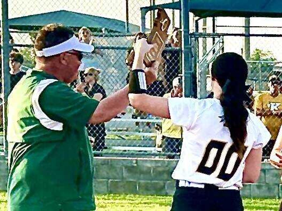 Malden AD Tim Harmon hands off the 2024 MHSAA C2D1 Tournament title plaque to Lady Indian Kaydee Taylor Tuesday at Malden.